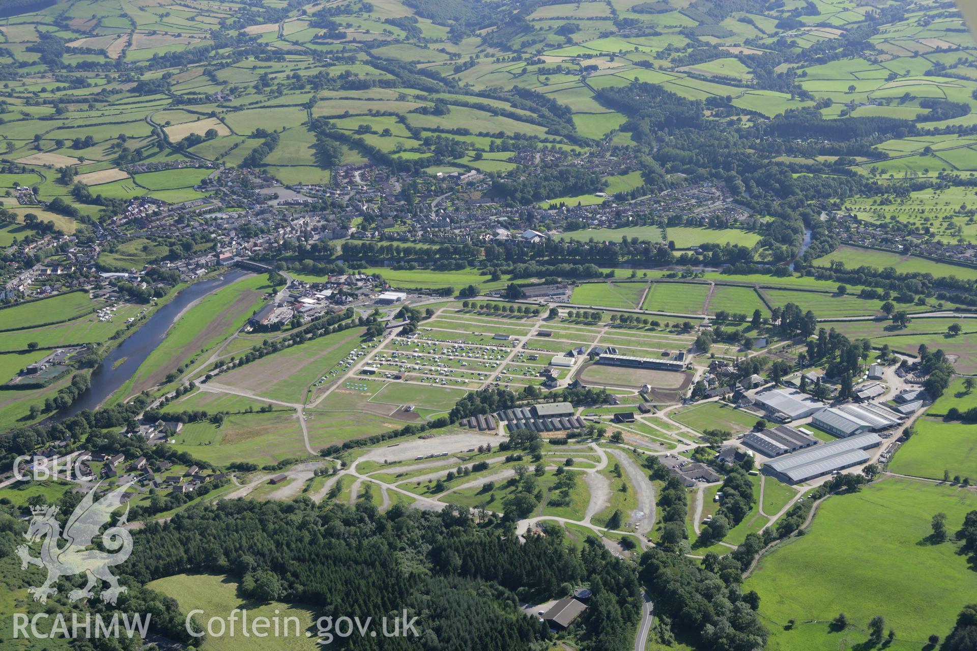 RCAHMW colour oblique aerial photograph of the Royal Welsh Showground, Llanelwedd. Taken on 08 August 2007 by Toby Driver