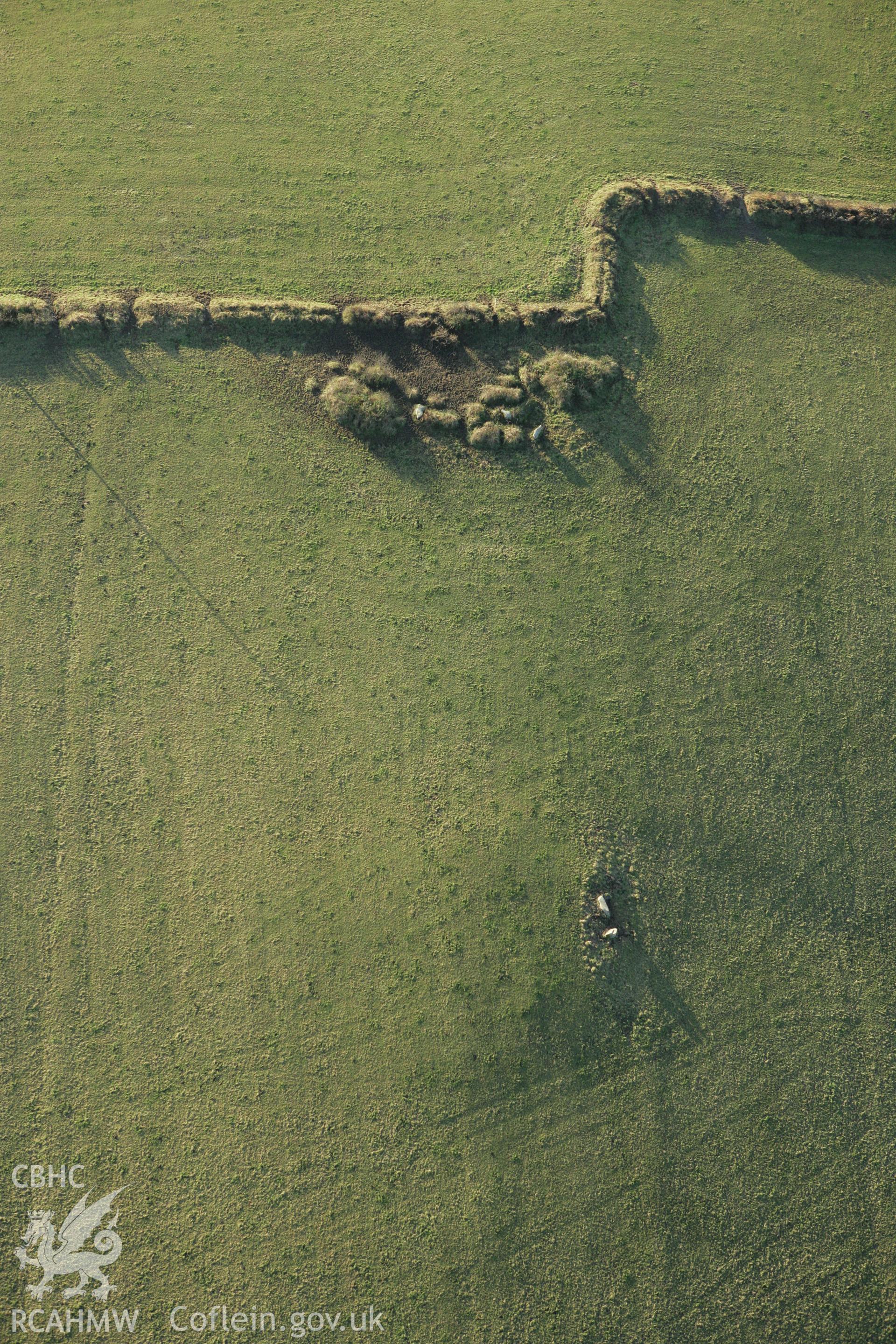 RCAHMW colour oblique photograph of Lan burial chambers. Taken by Toby Driver on 29/11/2007.