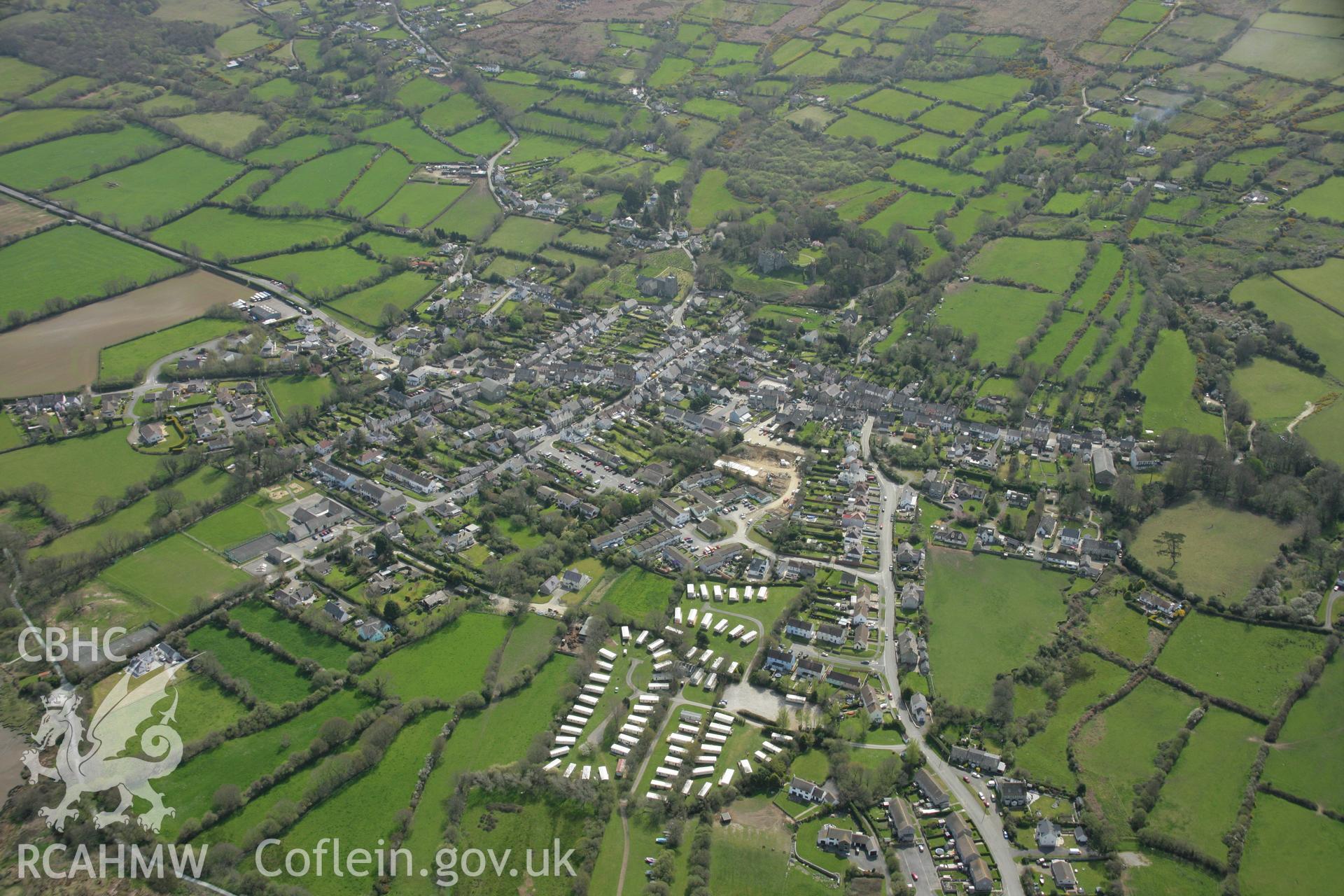 RCAHMW colour oblique aerial photograph showing view of town of Newport, Pembrokeshire. Taken on 17 April 2007 by Toby Driver