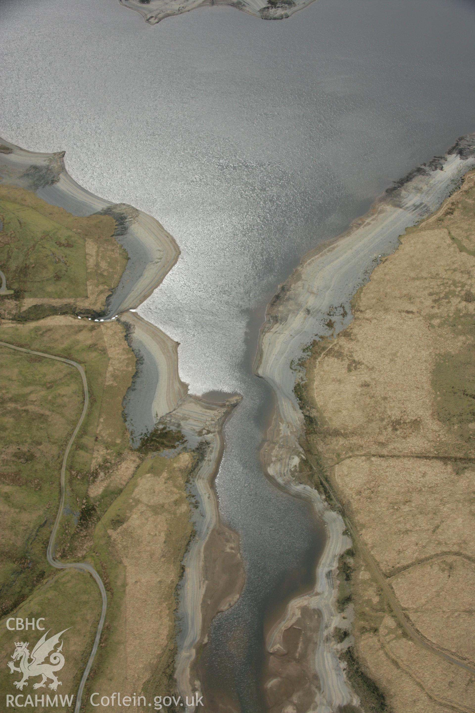 RCAHMW colour oblique aerial photograph of Bryn-Yr-Afr Lead Mine. Taken on 17 April 2007 by Toby Driver