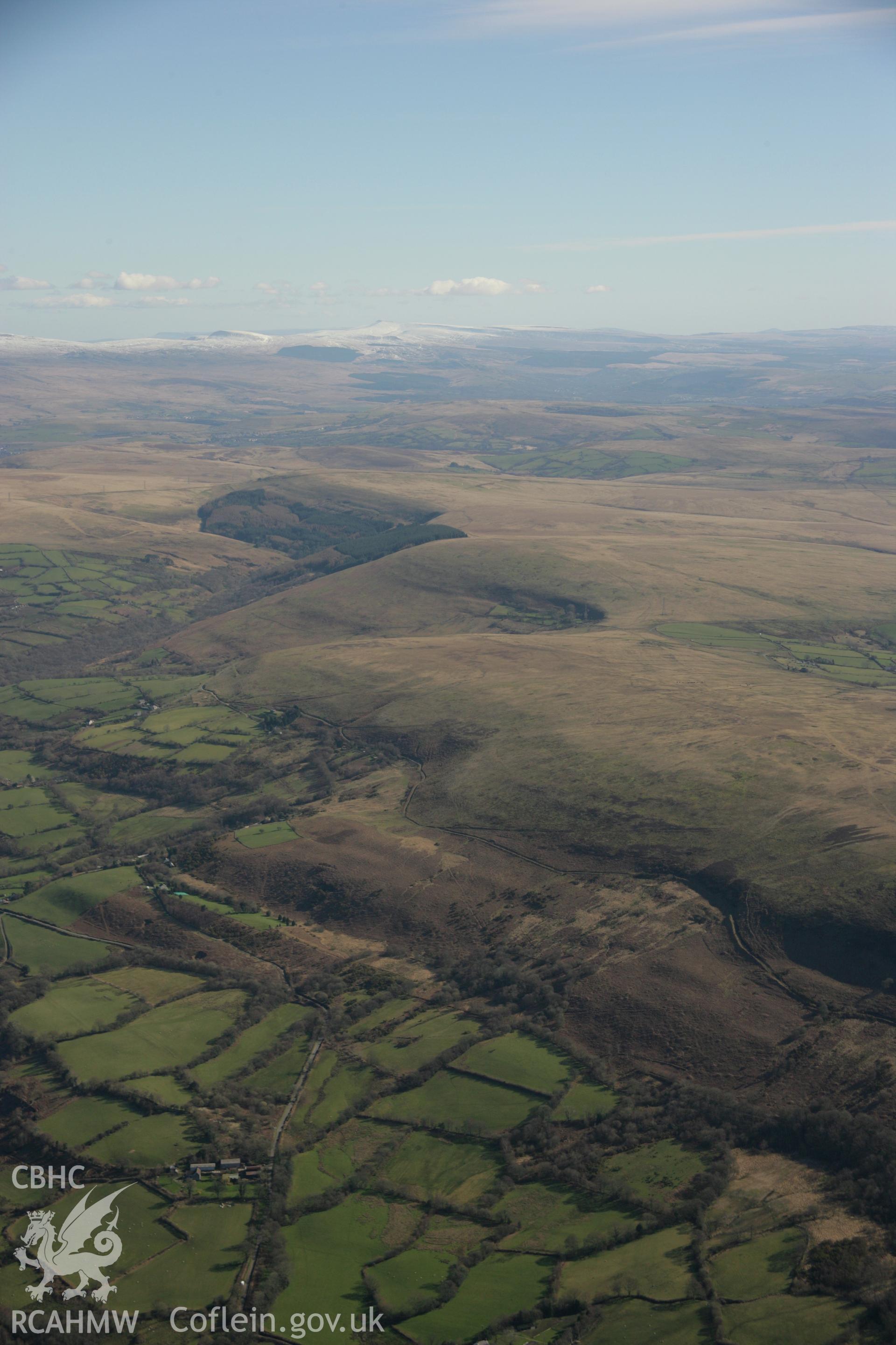 RCAHMW colour oblique aerial photograph of Graig Fawr (West) Enclosure in landscape view. Taken on 21 March 2007 by Toby Driver