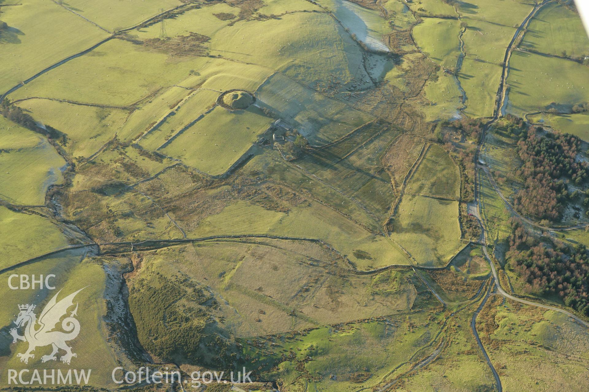 RCAHMW colour oblique photograph of Tomen y Mur Roman military settlement. Taken by Toby Driver on 20/12/2007.