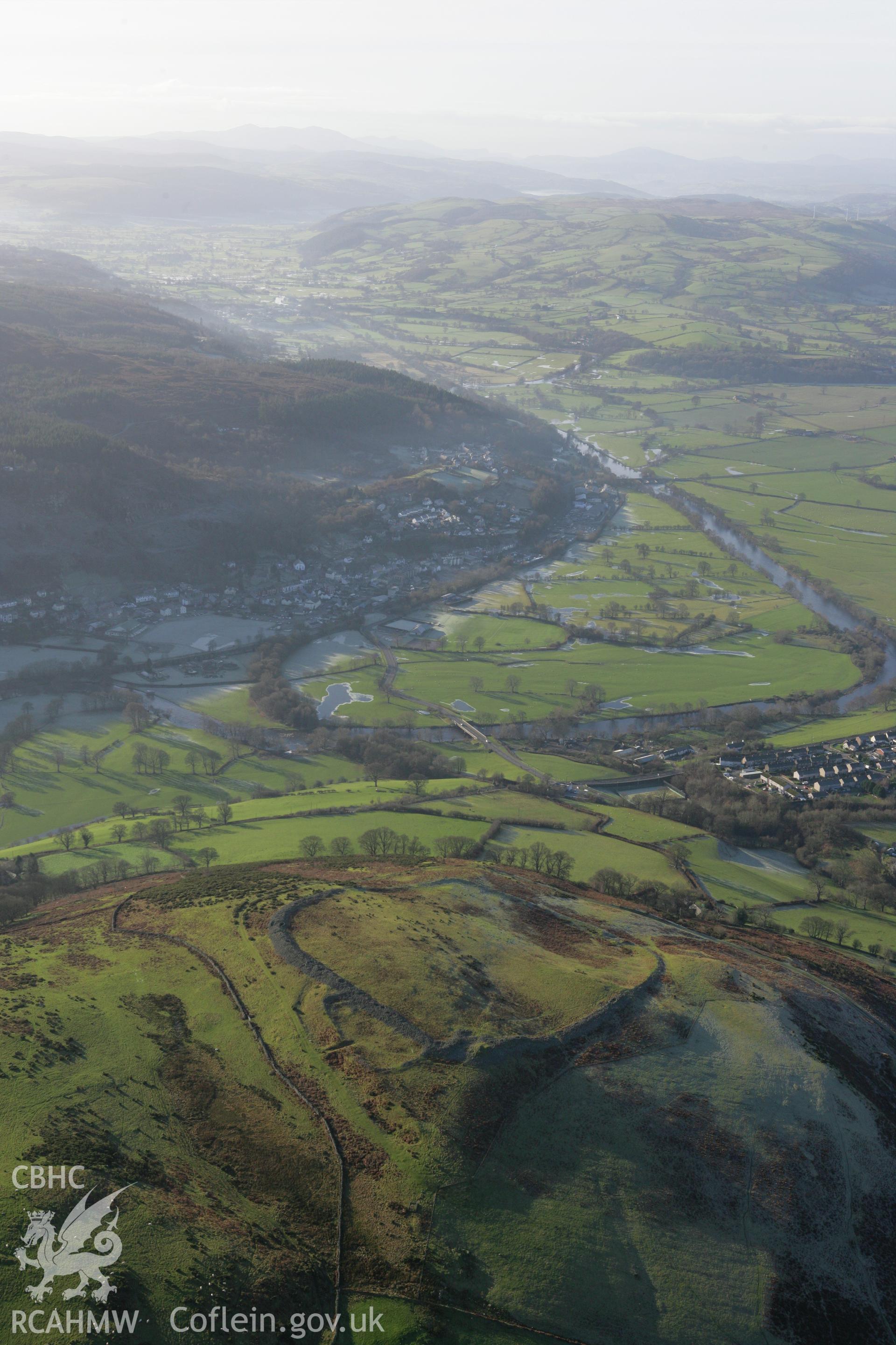 RCAHMW colour oblique photograph of Caer Drewyn, hillfort, with view to Dyffryn Edeirnion to south-west. Taken by Toby Driver on 11/12/2007.