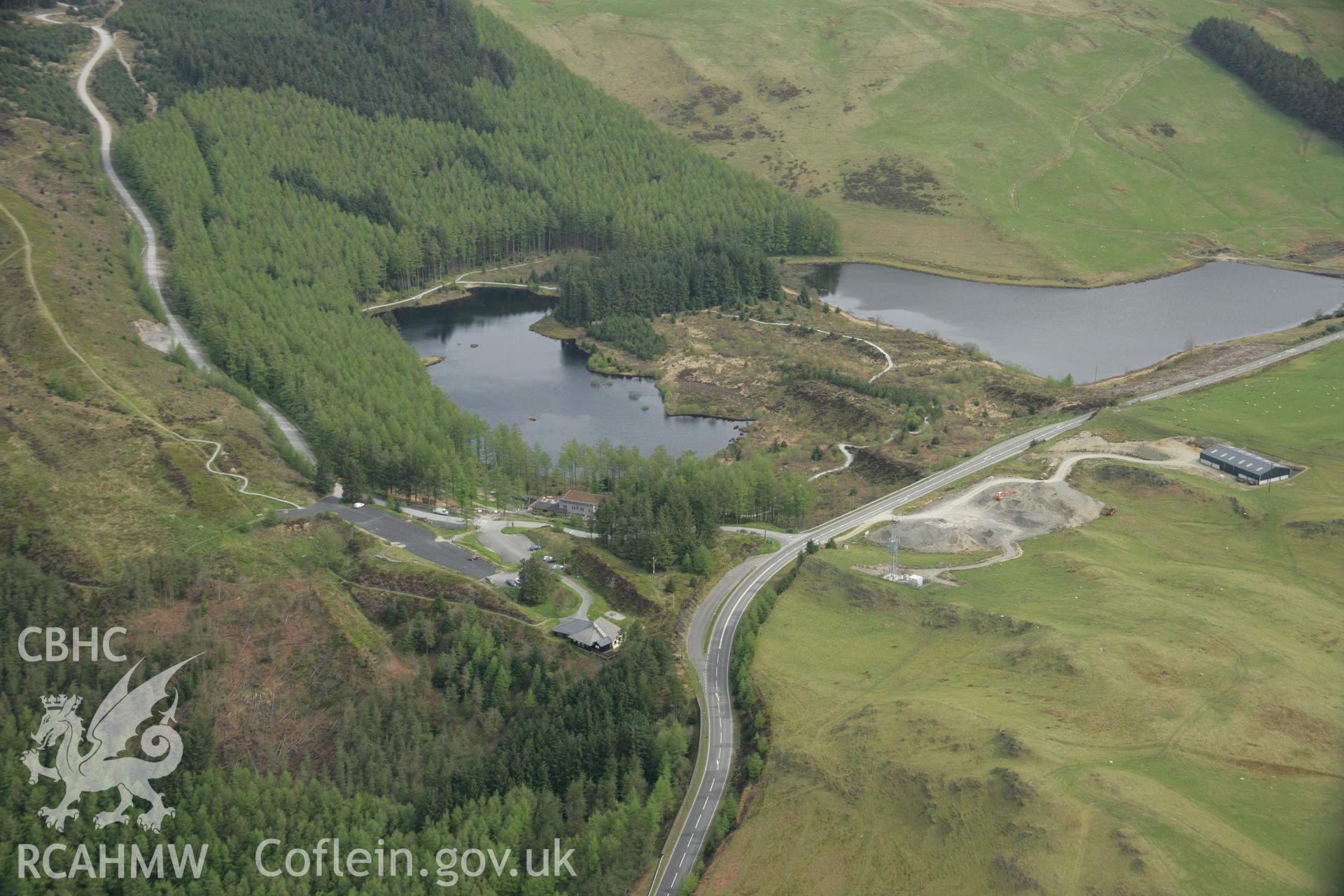RCAHMW colour oblique aerial photograph of Bwlch Nant-yr-Arian Forest Visitor Centre from the south-west. Taken on 17 April 2007 by Toby Driver