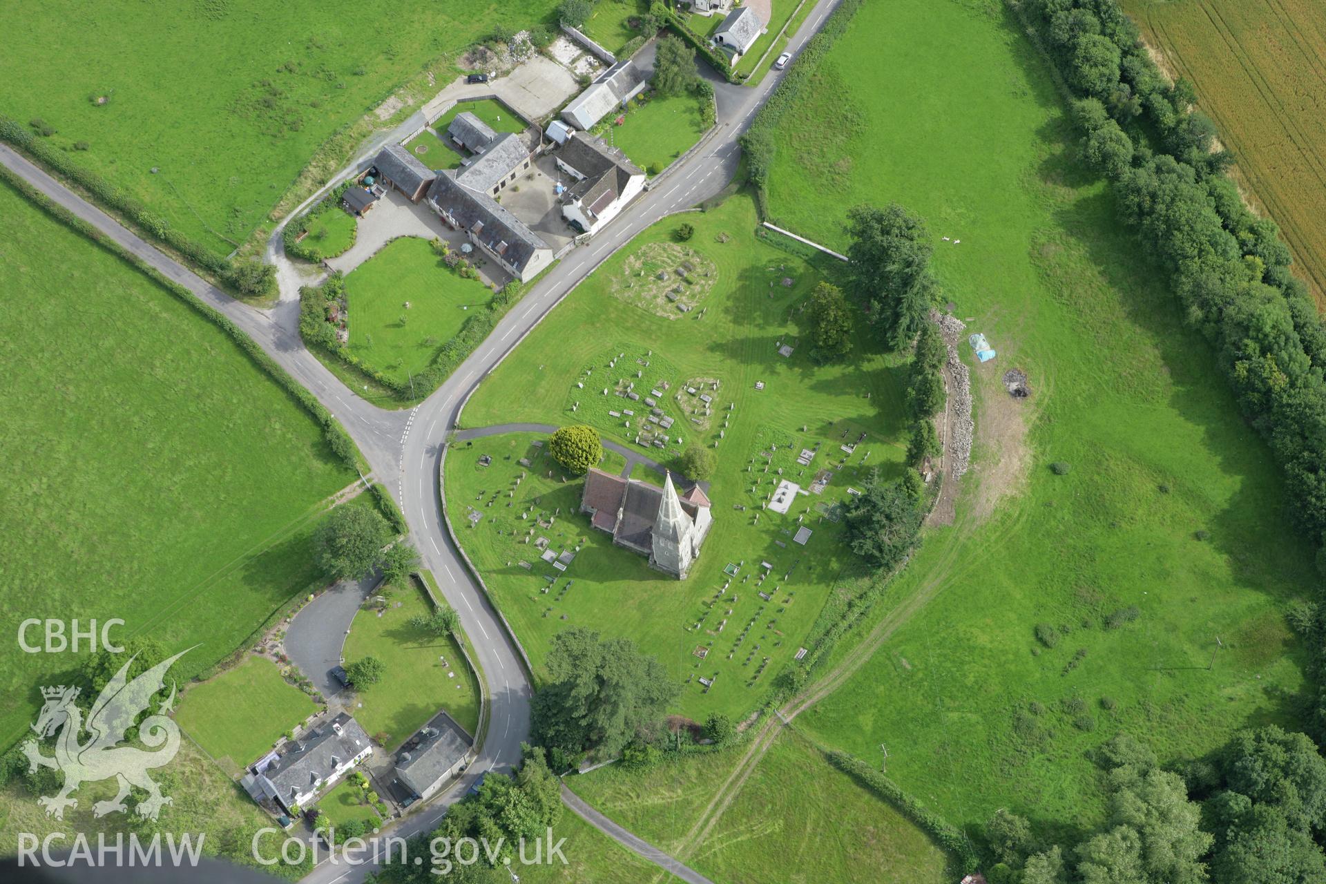 RCAHMW colour oblique aerial photograph of St. Cynog's Church, Boughrood. Taken on 09 July 2007 by Toby Driver