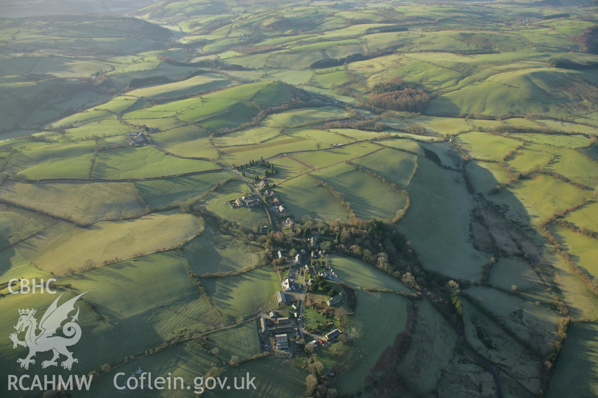 RCAHMW colour oblique aerial photograph of Llanfihangel-Yng-Ngwynfa, landscape view. Taken on 25 January 2007 by Toby Driver