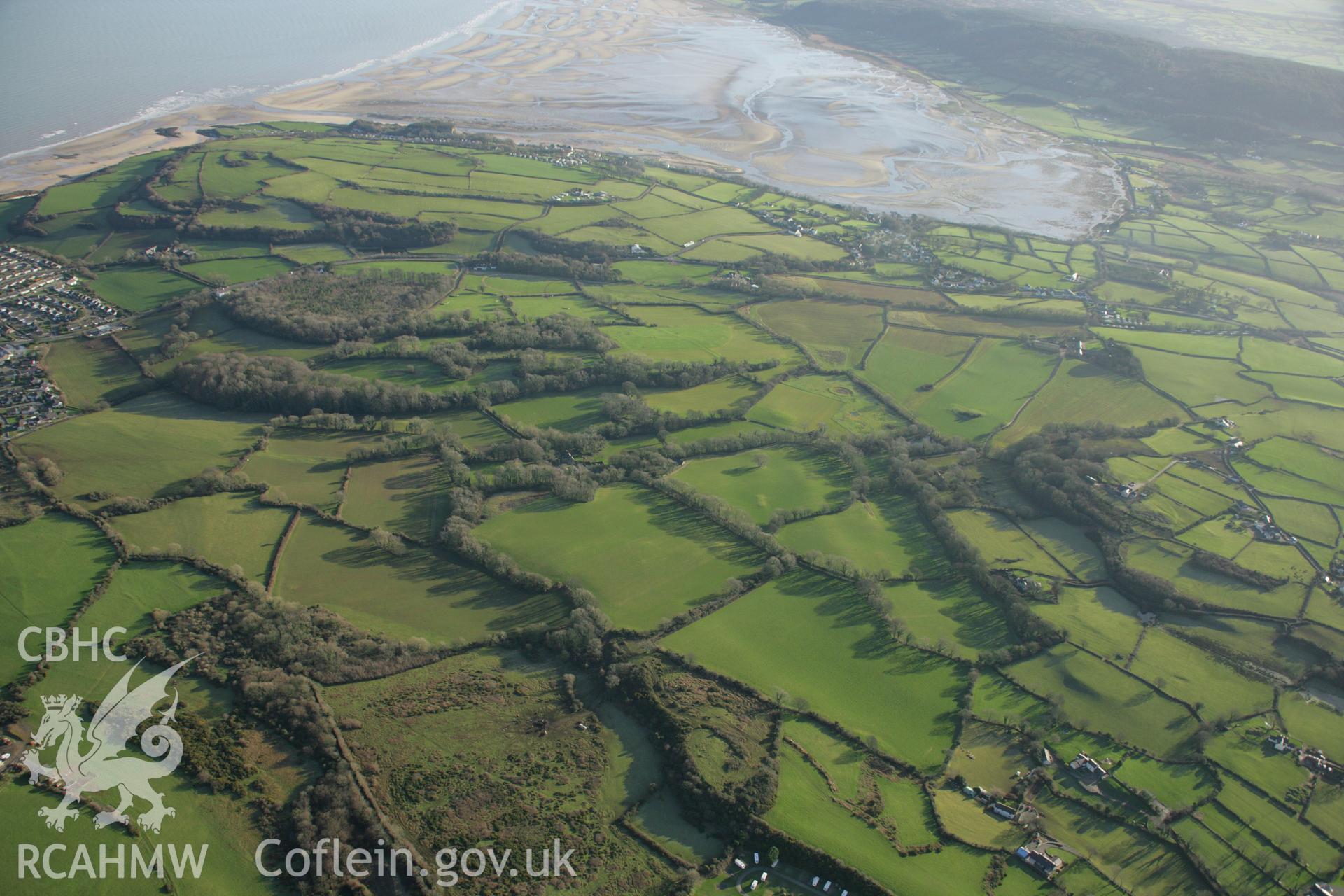 RCAHMW colour oblique aerial photograph of the Viking settlement at Glyn, Llanbedrgoch. Taken on 25 January 2007 by Toby Driver