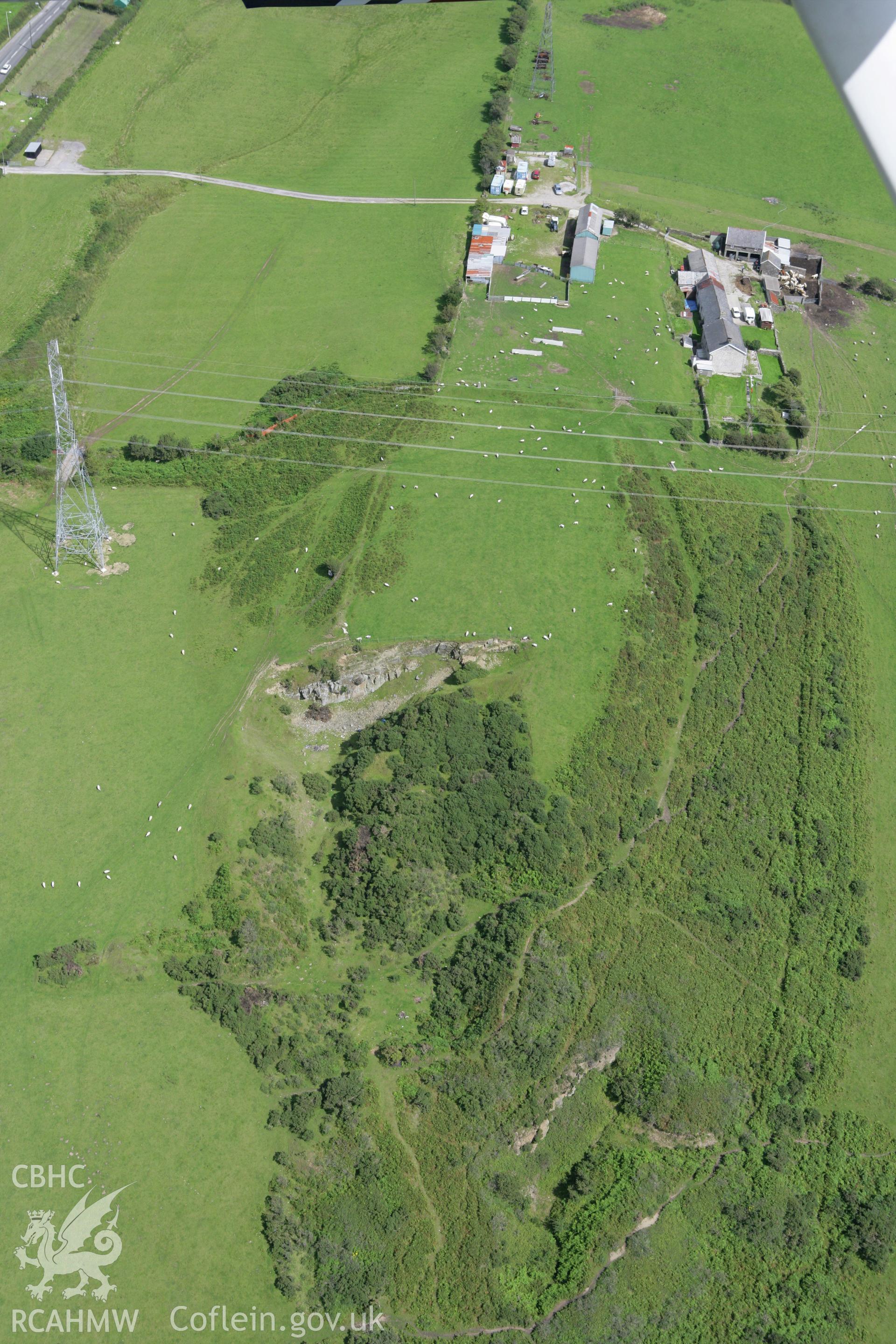 RCAHMW colour oblique aerial photograph of Pen-y-Castell. Taken on 30 July 2007 by Toby Driver