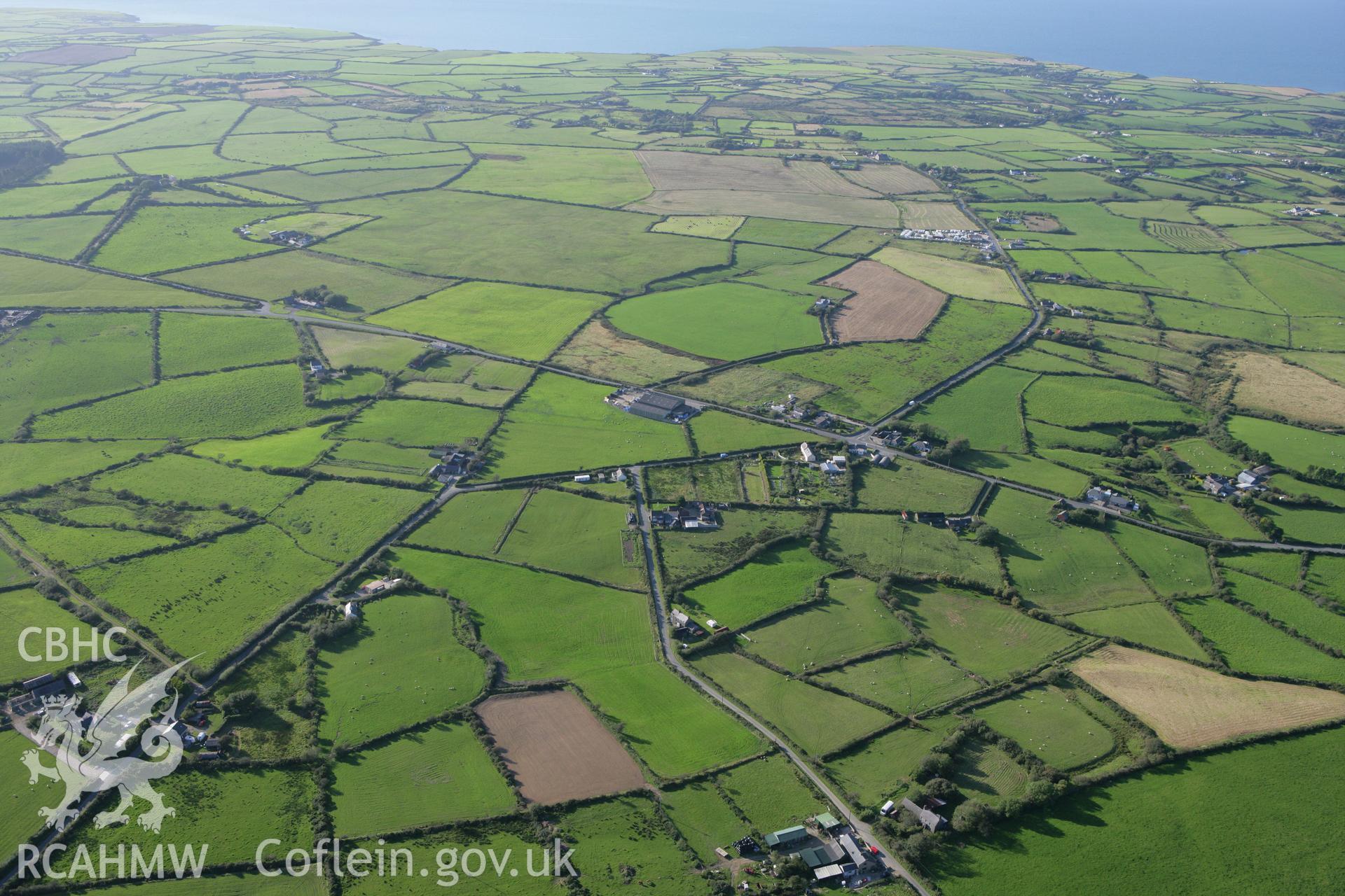 RCAHMW colour oblique aerial photograph of the site of former standing stone, Maenhir, Pen-y-groeslon. Taken on 06 September 2007 by Toby Driver