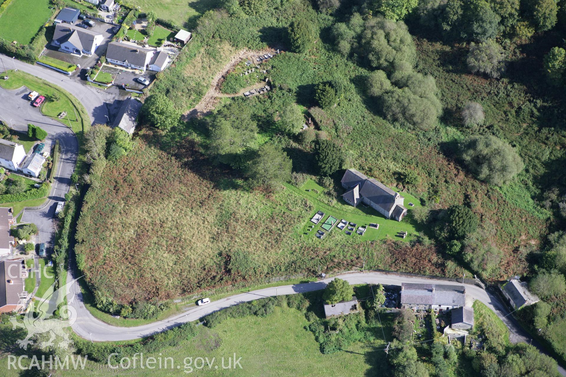 RCAHMW colour oblique photograph of St. Lucia's Church, Abernant. Taken by Toby Driver on 04/10/2007.