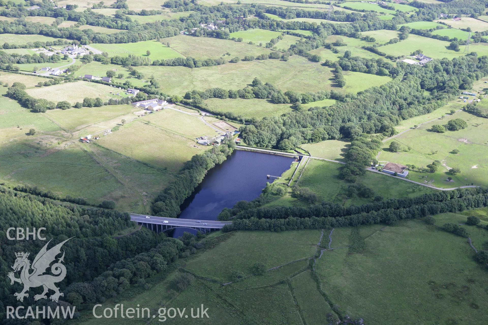 RCAHMW colour oblique aerial photograph of Nant Hir Reservoir and Dam, Aberdare. Taken on 30 July 2007 by Toby Driver