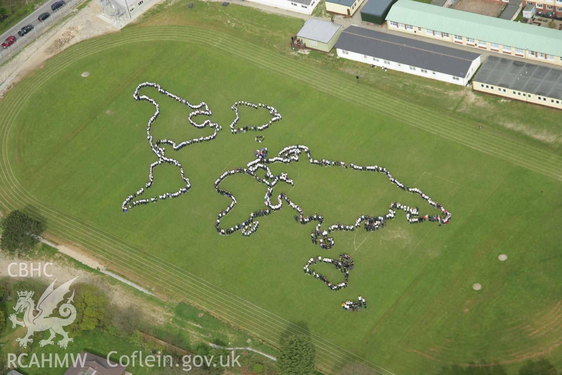 RCAHMW colour oblique aerial photograph of Penglais Comprehensive School, World Map of 1500 pupils. Taken on 17 April 2007 by Toby Driver