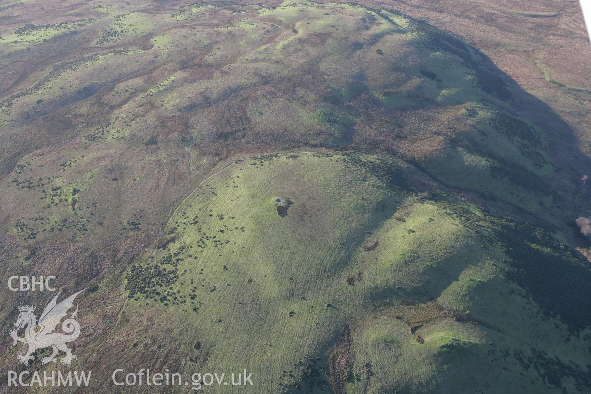 RCAHMW colour oblique photograph of Pen Cad Cymry Cairn. Taken by Toby Driver on 11/12/2007.