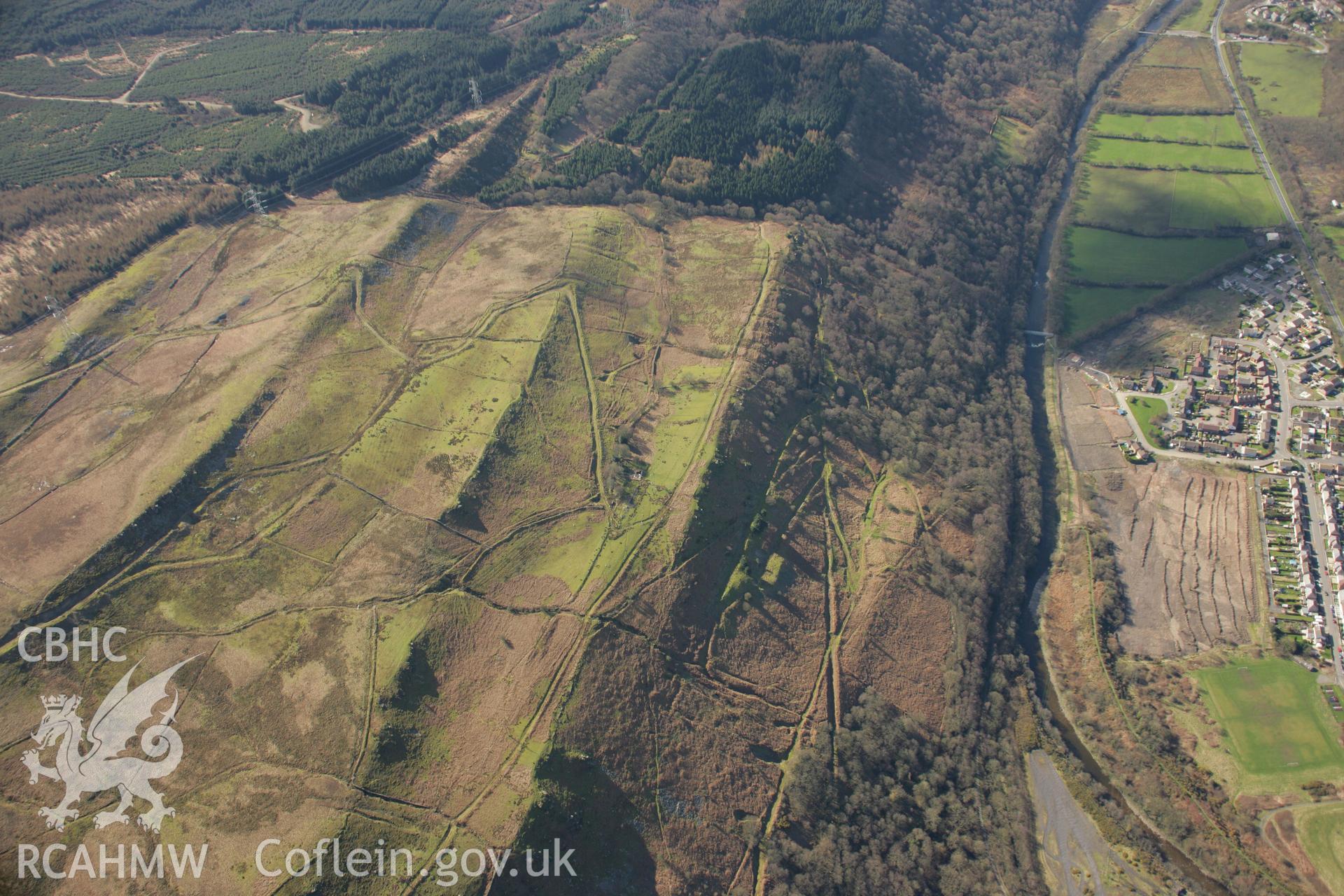 RCAHMW colour oblique aerial photograph of Y Darren Widdon and Darren Fach Mining Landscape,  Ystalyfera. Taken on 21 March 2007 by Toby Driver