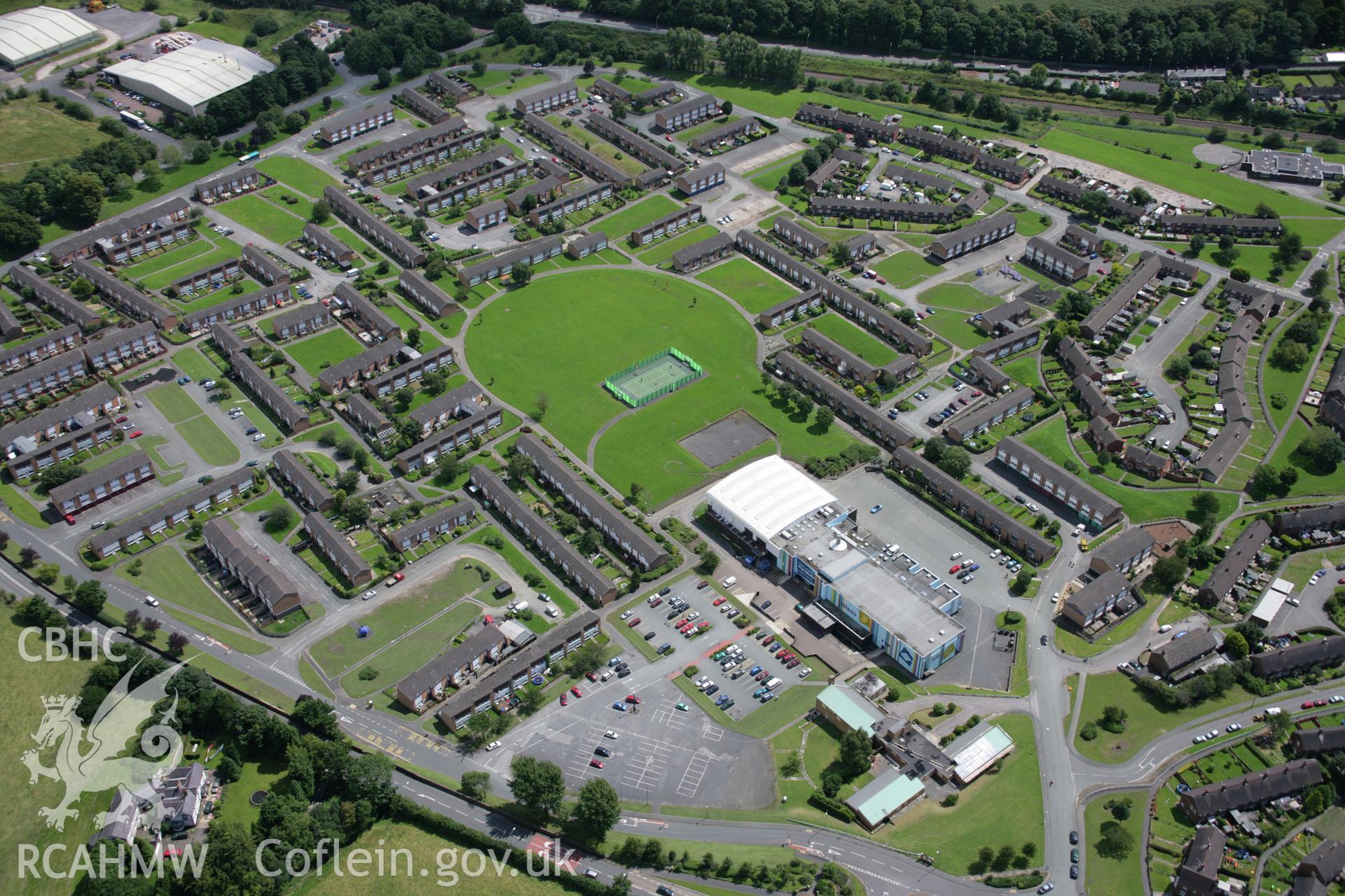 RCAHMW colour oblique aerial photograph of Plas Madoc Housing Estate. Taken on 24 July 2007 by Toby Driver