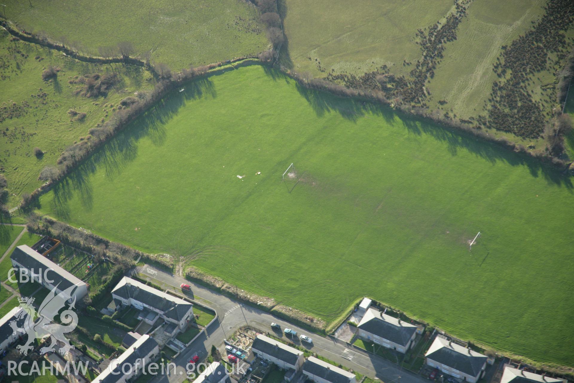 RCAHMW colour oblique aerial photograph of the Tyddyn Pandy Square Barrow Cemetery. Taken on 25 January 2007 by Toby Driver