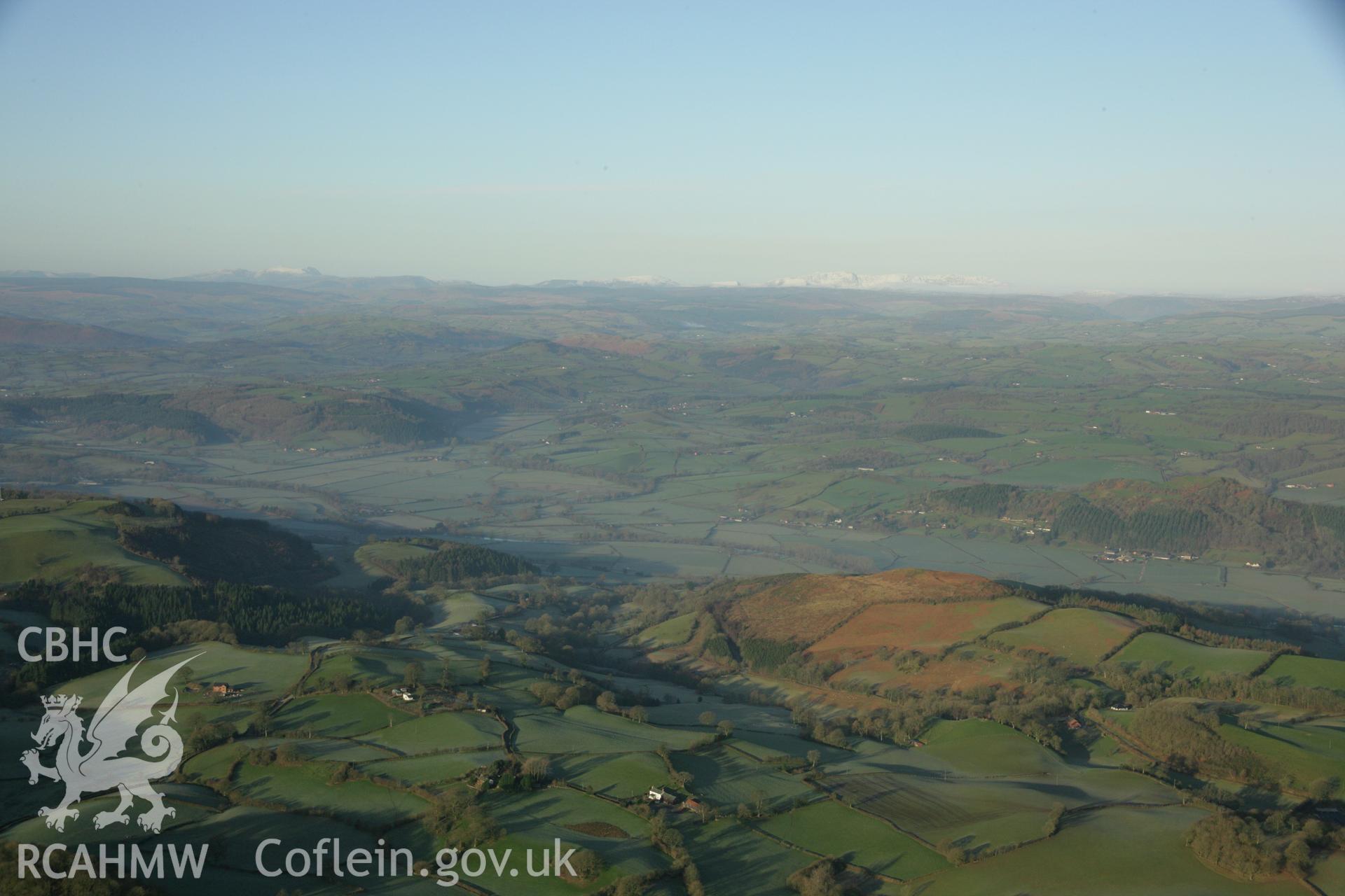RCAHMW colour oblique aerial photograph of Meifod in landscape view. Taken on 25 January 2007 by Toby Driver