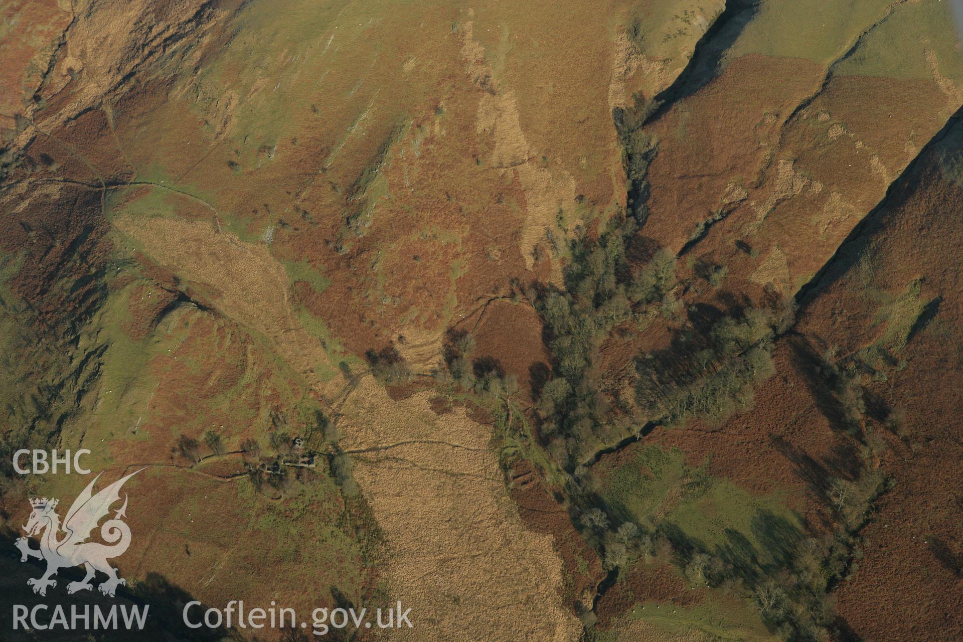 RCAHMW colour oblique photograph of Dinas Foelfraeth farmstead. Taken by Toby Driver on 20/12/2007.