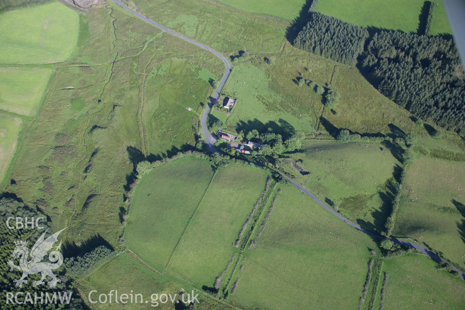 RCAHMW colour oblique aerial photograph of Spite Inn. Taken on 08 August 2007 by Toby Driver