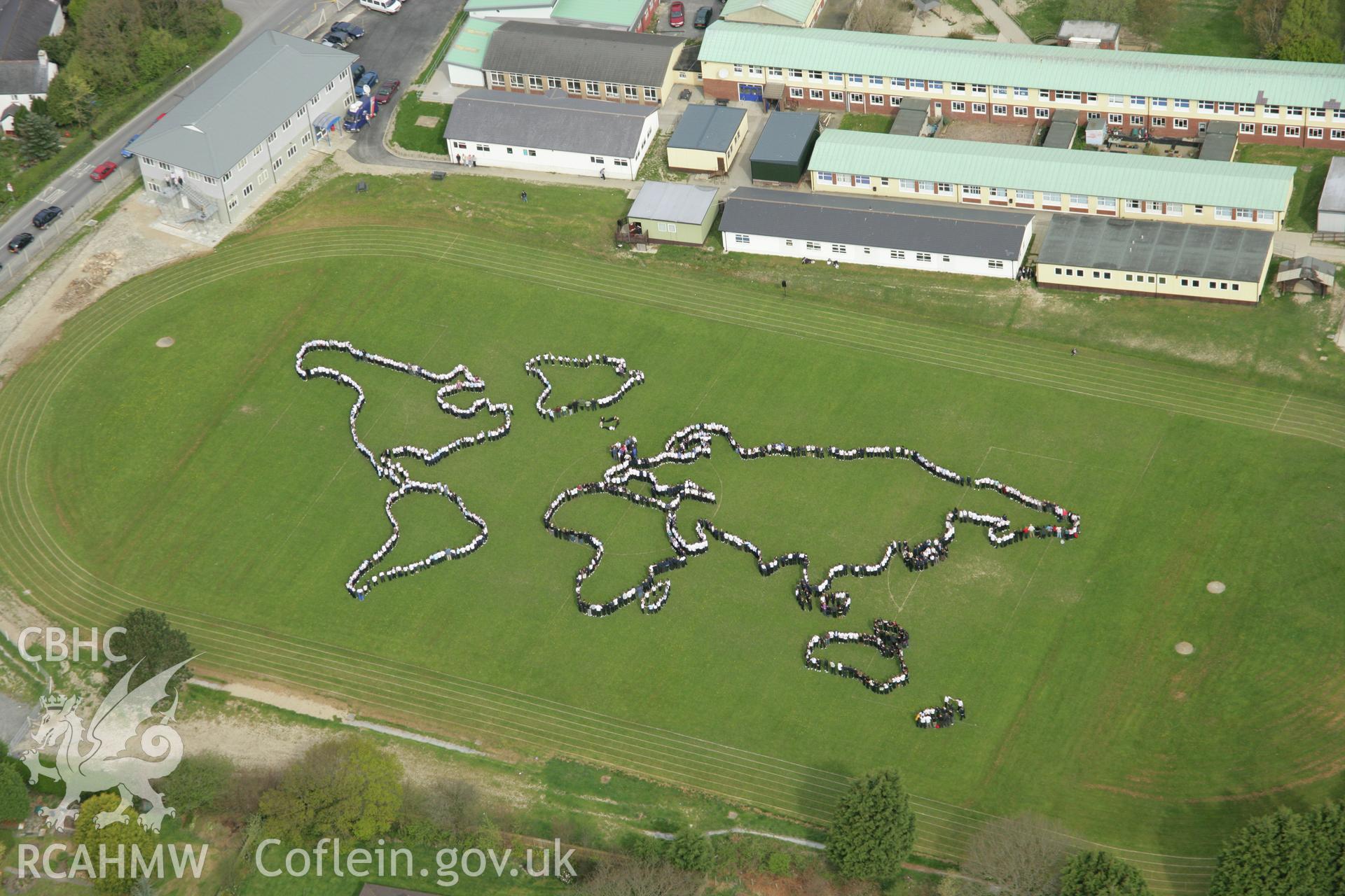 RCAHMW colour oblique aerial photograph of Penglais Comprehensive School, World Map of 1500 pupils. Taken on 17 April 2007 by Toby Driver