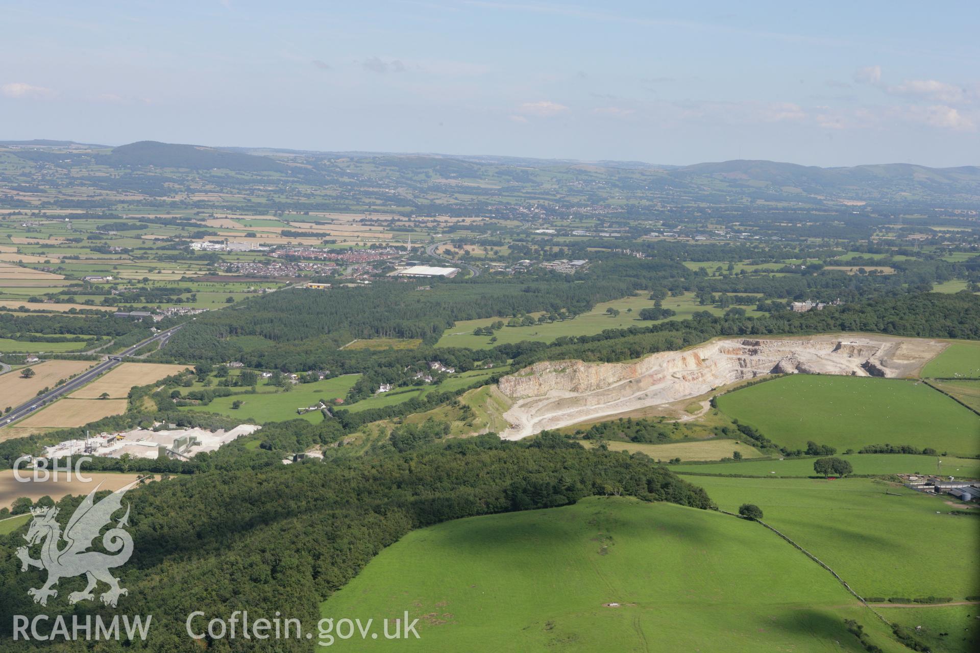 RCAHMW colour oblique aerial photograph of the landscape east over Dinorben Hillfort. Taken on 31 July 2007 by Toby Driver