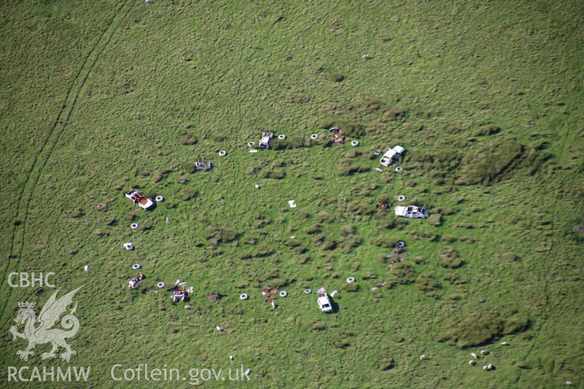 RCAHMW colour oblique aerial photograph of Sennybridge Military Training Area, Mynydd Epynt, showing a car target south of Garn Wen. Taken on 08 August 2007 by Toby Driver