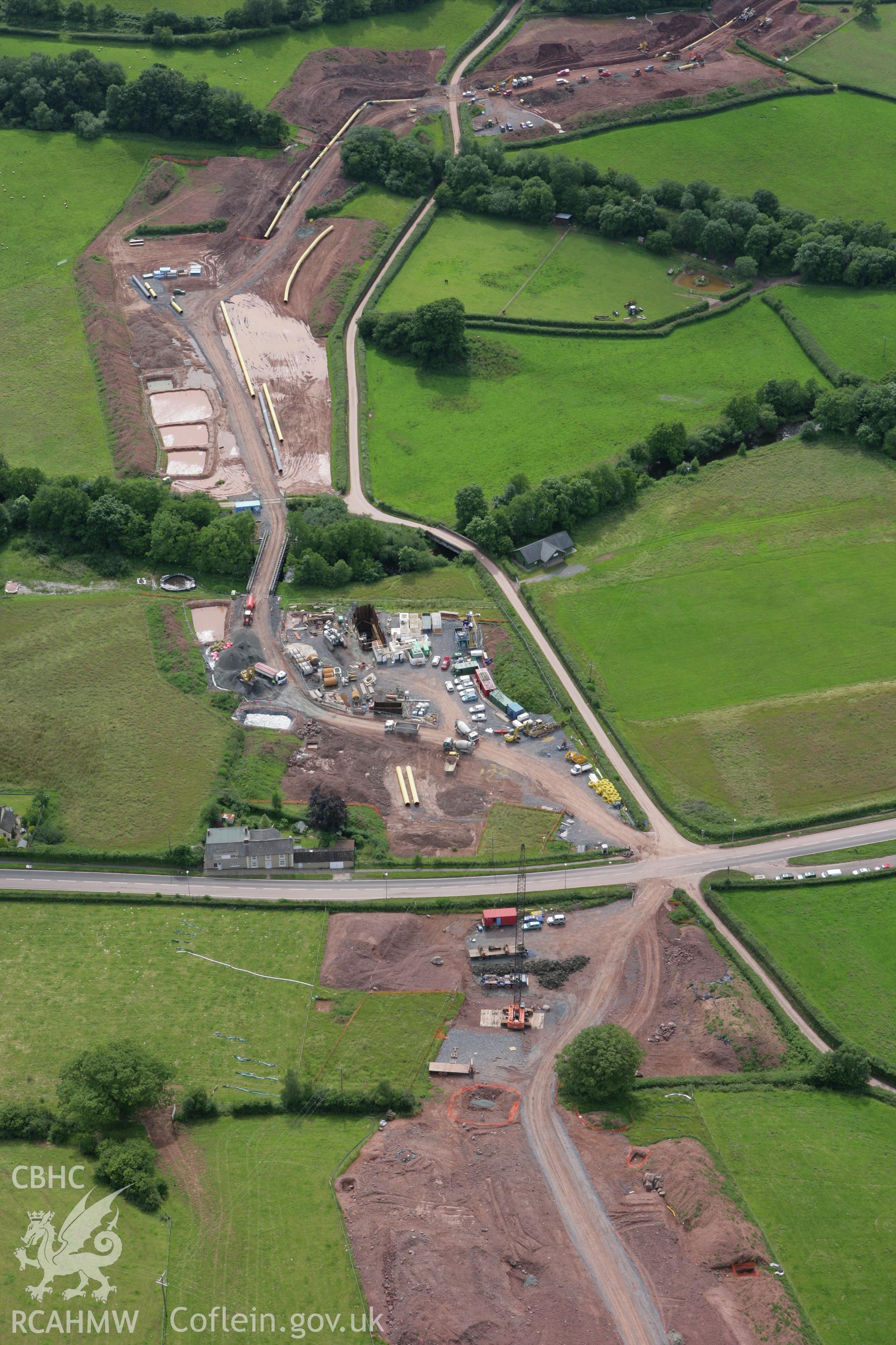 RCAHMW colour oblique aerial photograph of a section of the LNG pipeline at Defynnog. Taken on 09 July 2007 by Toby Driver