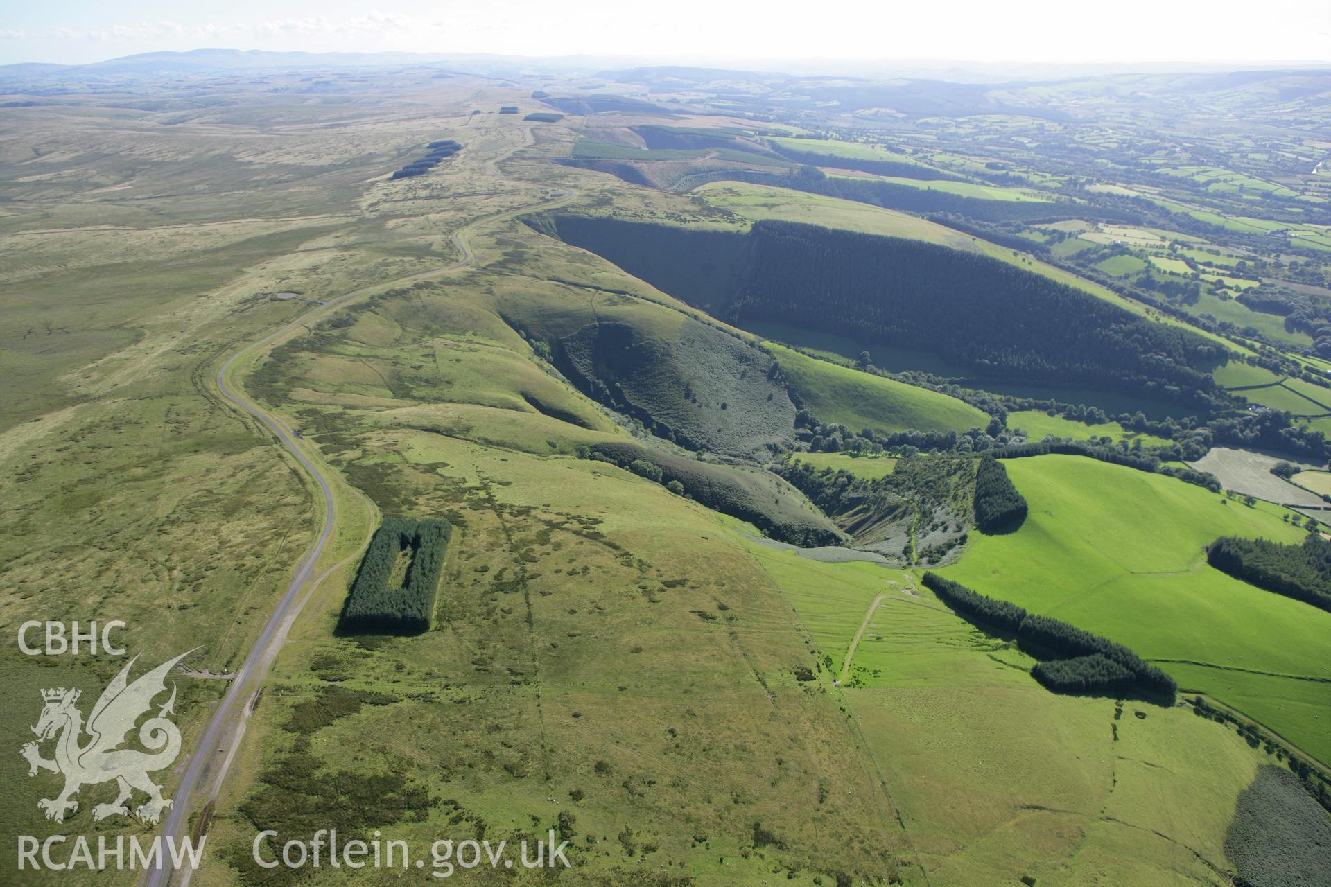 RCAHMW colour oblique aerial photograph of Sennybridge Military Training Area, Mynydd Epynt, showing the northern escarpment from the north-east. Taken on 08 August 2007 by Toby Driver