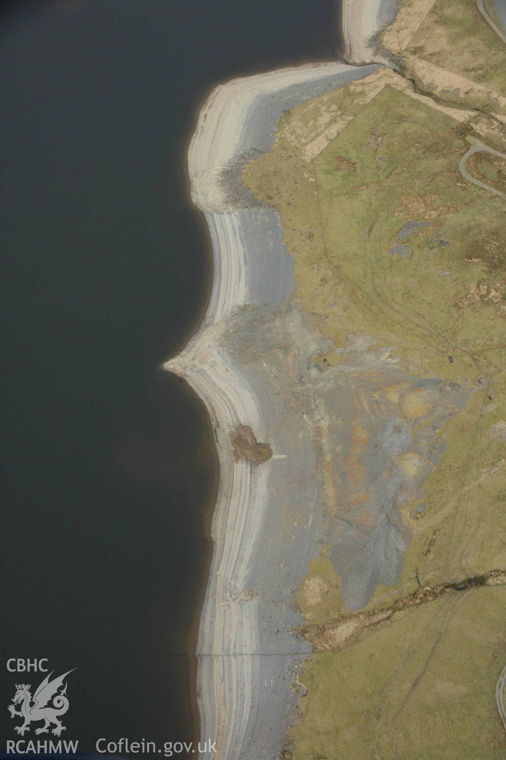 RCAHMW colour oblique aerial photograph of Bryn-Yr-Afr Lead Mine. Taken on 17 April 2007 by Toby Driver