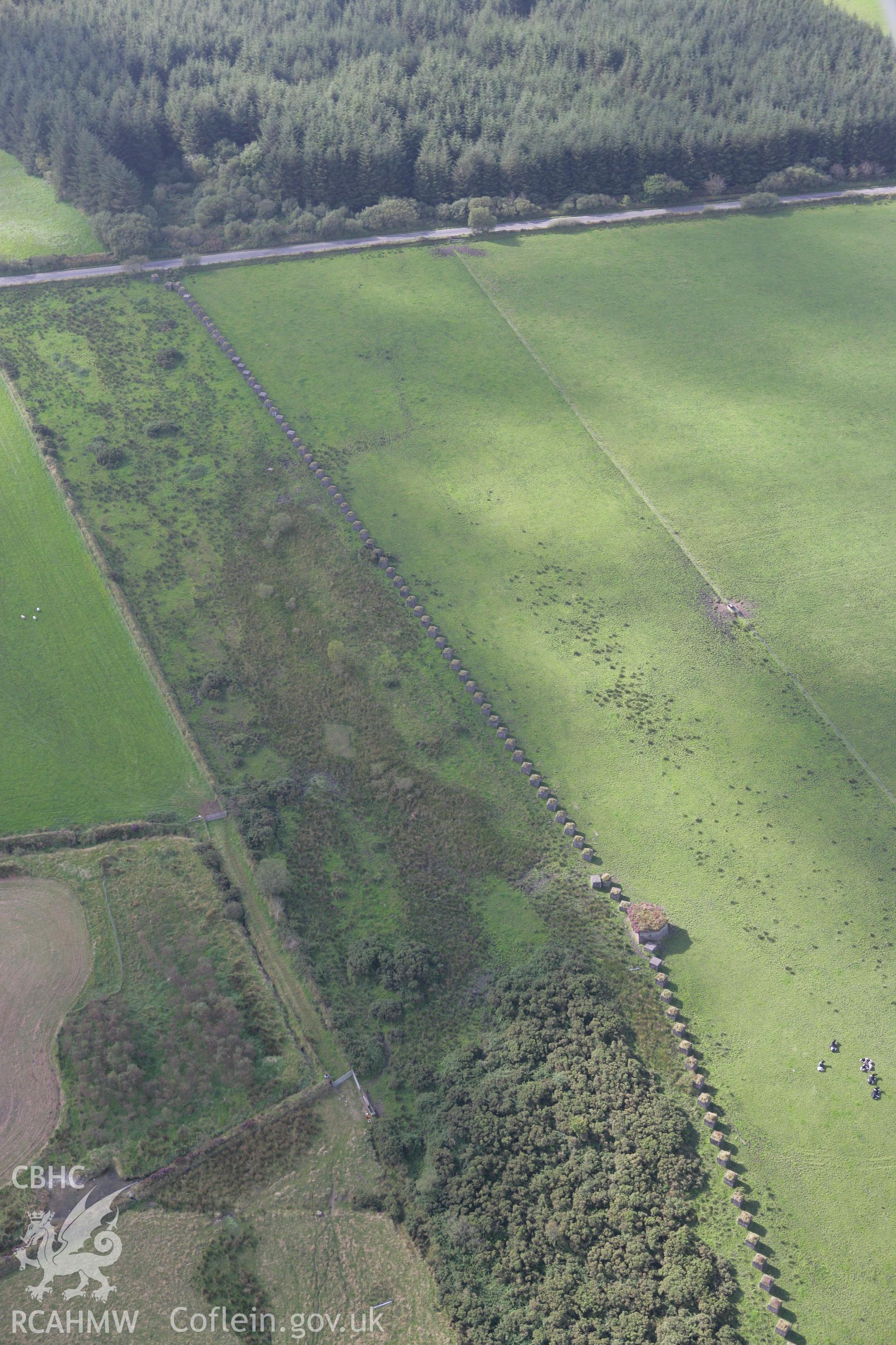 RCAHMW colour oblique photograph of Rhos-Llangeler stop line, anti tank ditch. Taken by Toby Driver on 11/09/2007.
