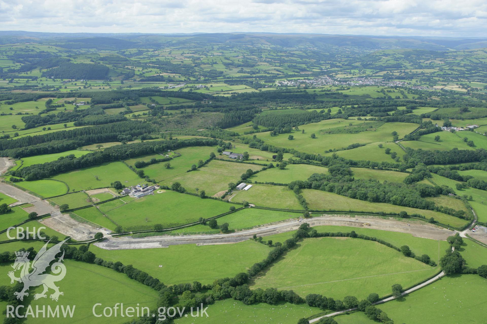 RCAHMW colour oblique aerial photograph of LNG pipeline approaching Mynydd Myddfai. Taken on 09 July 2007 by Toby Driver