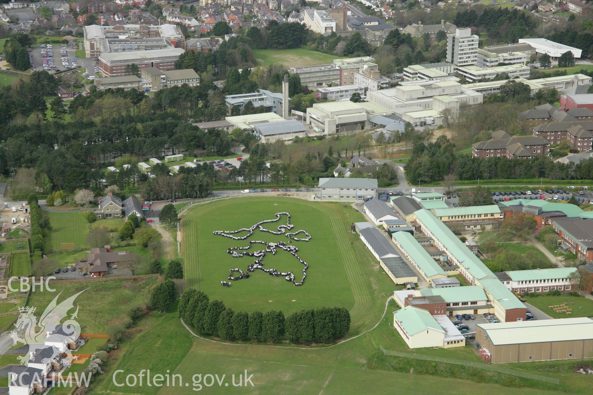 RCAHMW colour oblique aerial photograph of Penglais Comprehensive School, World Map of 1500 pupils. Taken on 17 April 2007 by Toby Driver
