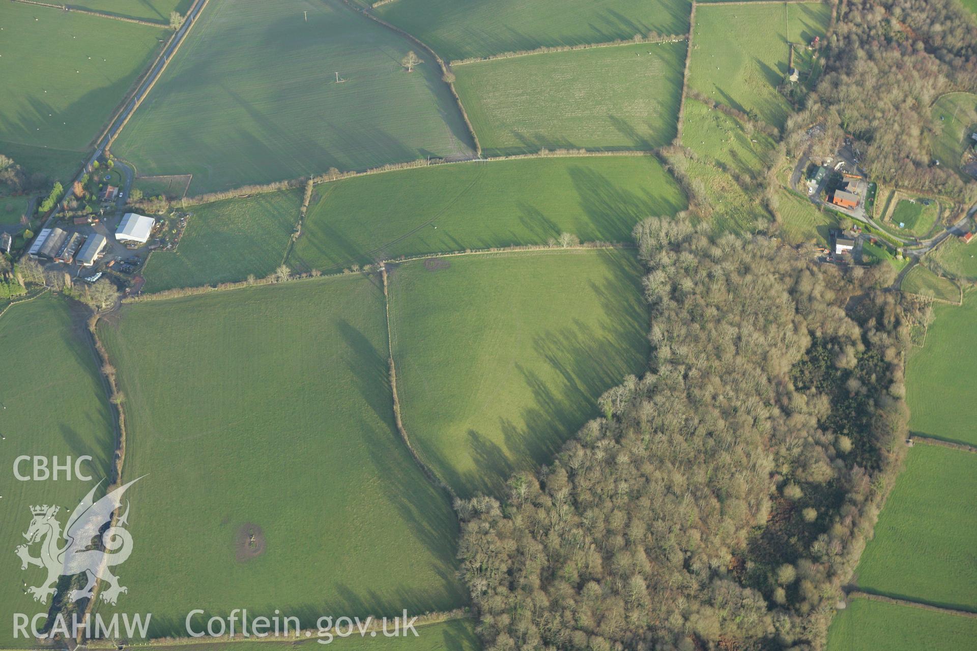 RCAHMW colour oblique photograph of Gwynfynydd Farm, probable defended enclosure. Taken by Toby Driver on 11/12/2007.