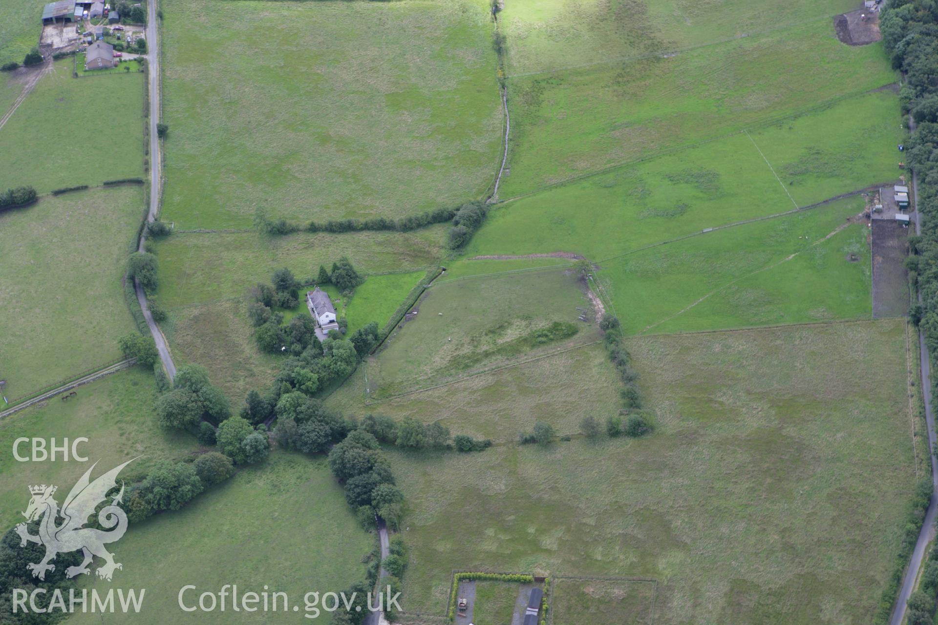 RCAHMW colour oblique aerial photograph of Ffridd Roman Mining Settlement. Taken on 24 July 2007 by Toby Driver