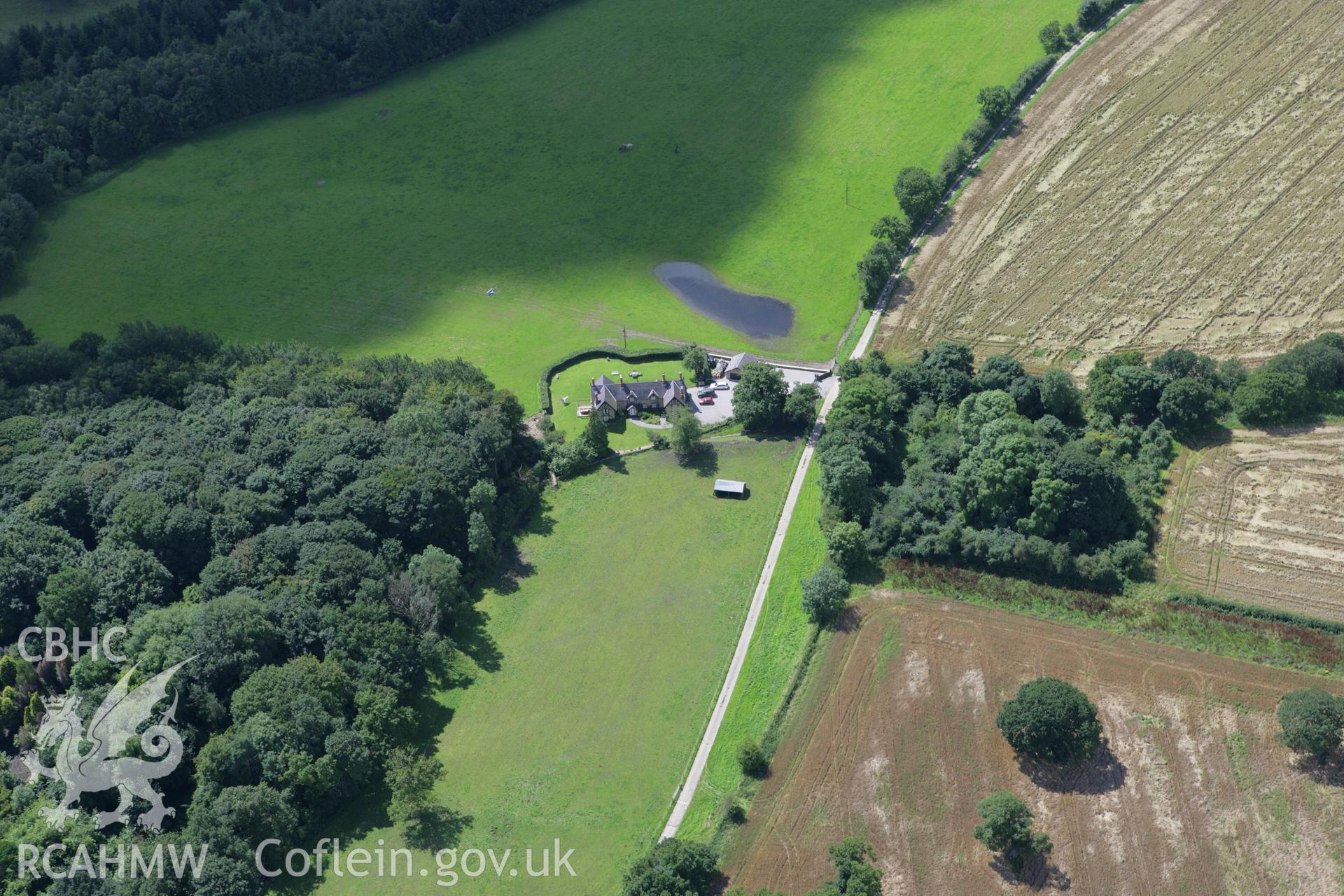 RCAHMW colour oblique aerial photograph of a section of Offa's Dyke at Plas Power. Taken on 24 July 2007 by Toby Driver
