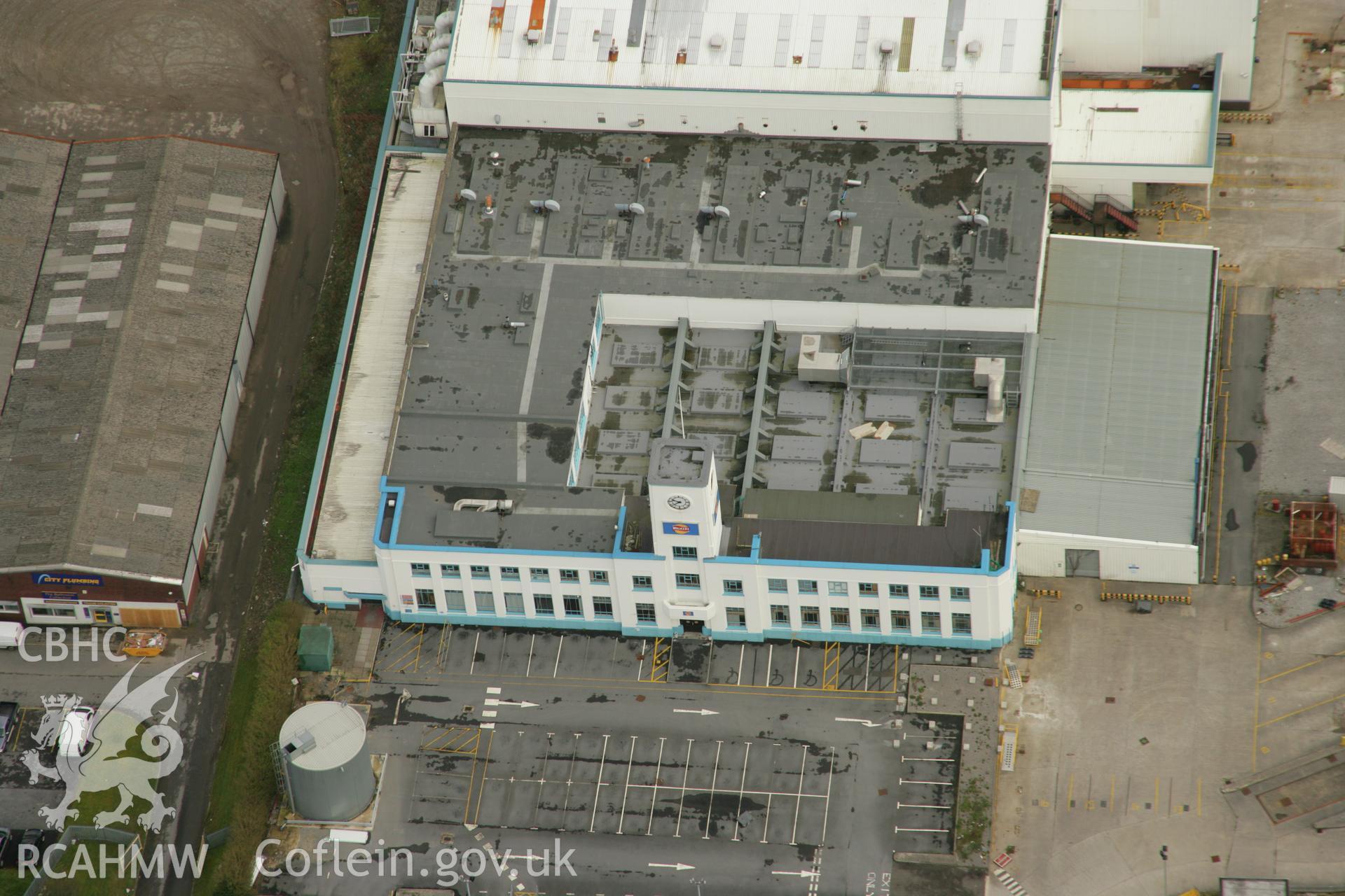 RCAHMW colour oblique aerial photograph of Walkers Snack Foods Ltd, Fforestfach. Taken on 16 March 2007 by Toby Driver