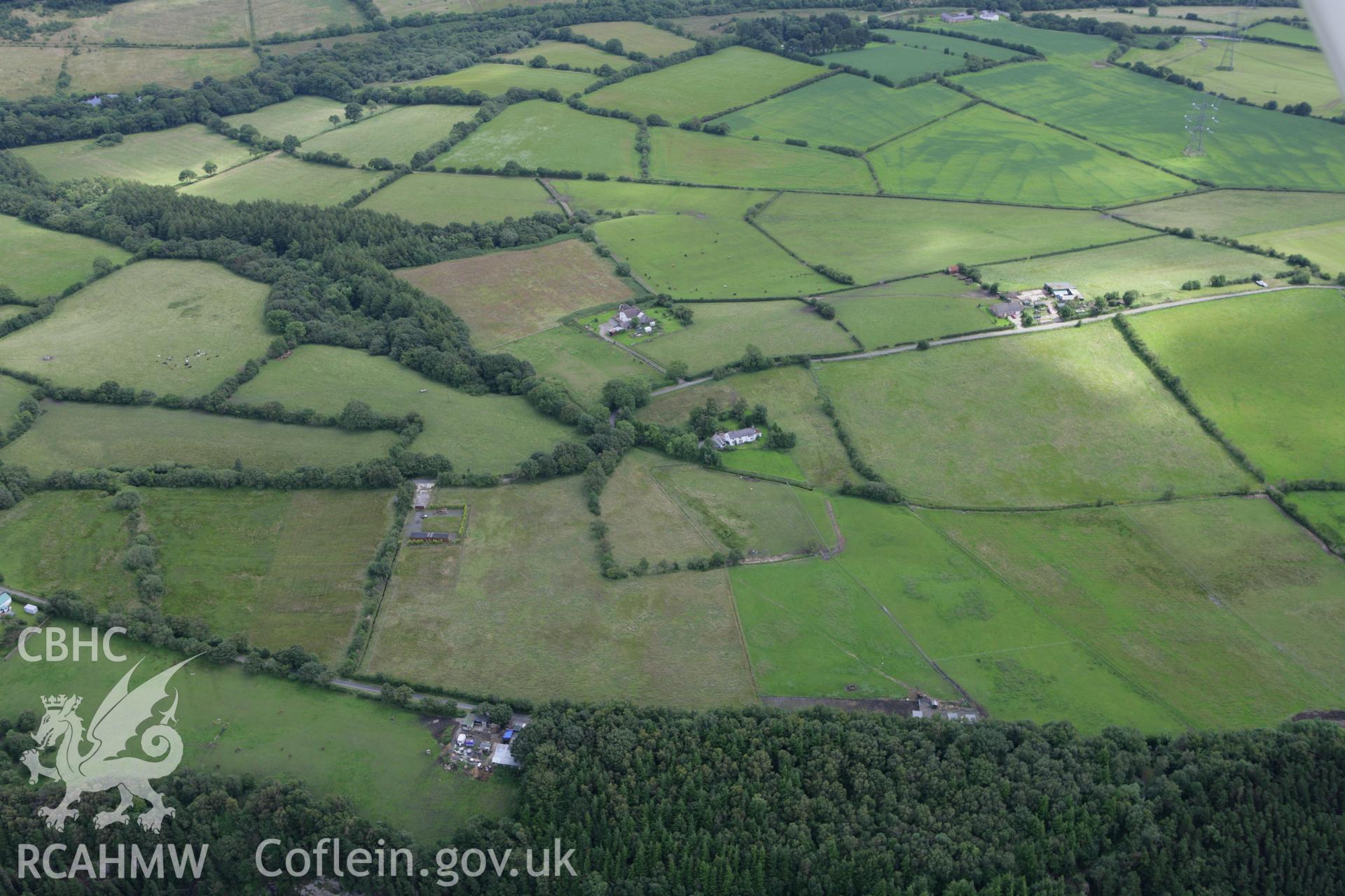 RCAHMW colour oblique aerial photograph of Ffridd Roman Mining Settlement. Taken on 24 July 2007 by Toby Driver