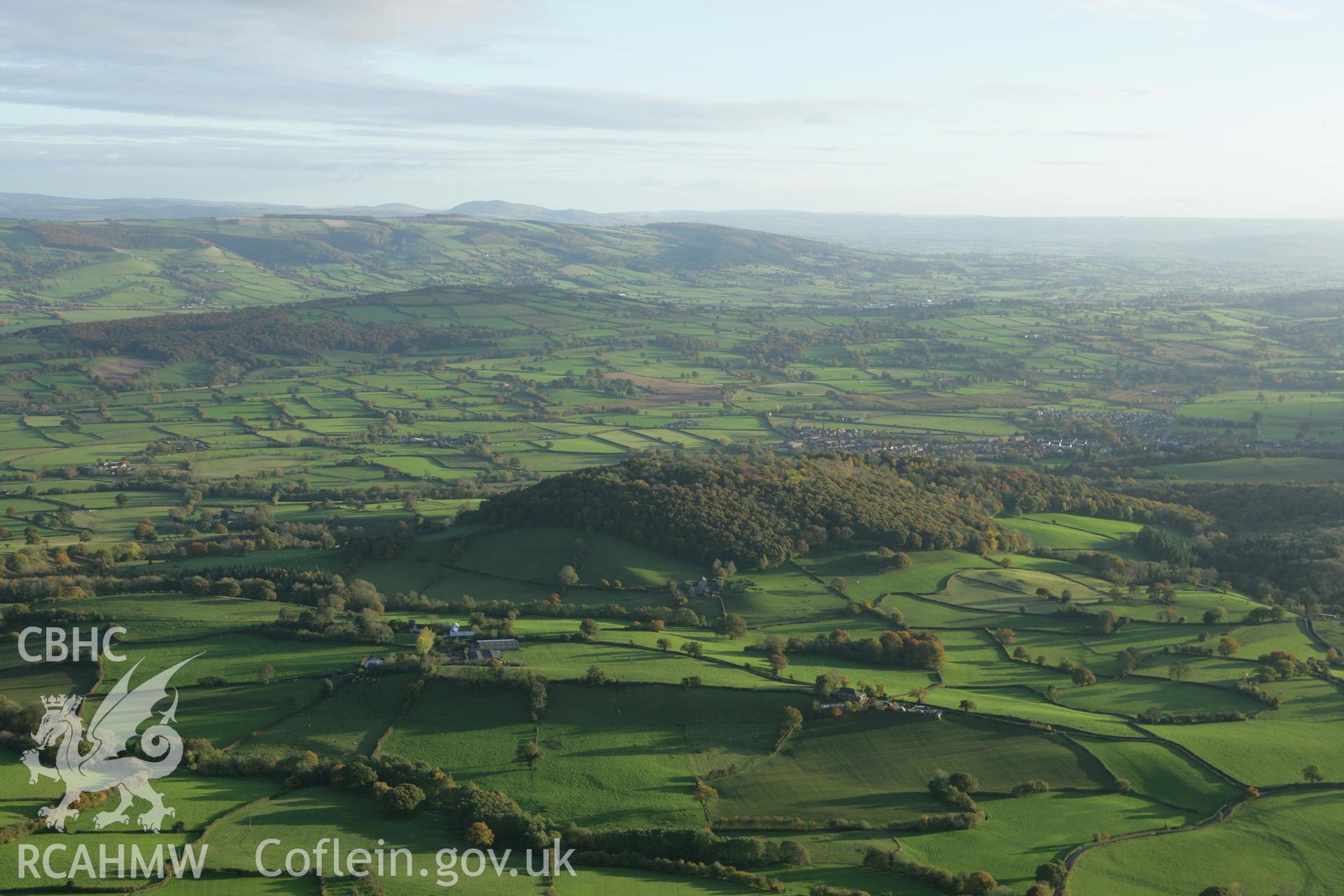 RCAHMW colour oblique photograph of Gaer Fawr hillfort, Guilsfield. Taken by Toby Driver on 30/10/2007.