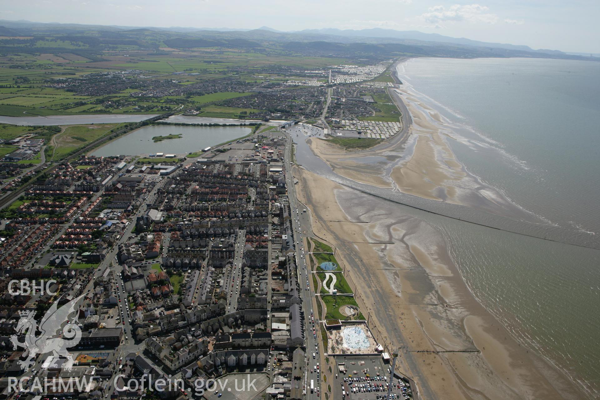 RCAHMW colour oblique aerial photograph of Rhyl looking west to Kinmel Bay. Taken on 31 July 2007 by Toby Driver