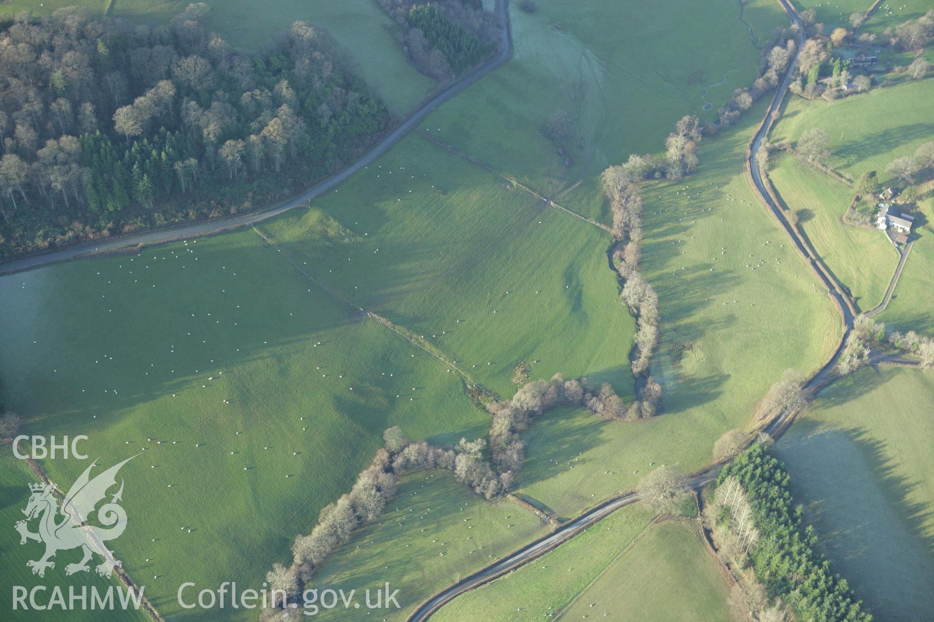 RCAHMW colour oblique photograph of Sycarth Castle, motte and bailey, earthworks near. Taken by Toby Driver on 11/12/2007.
