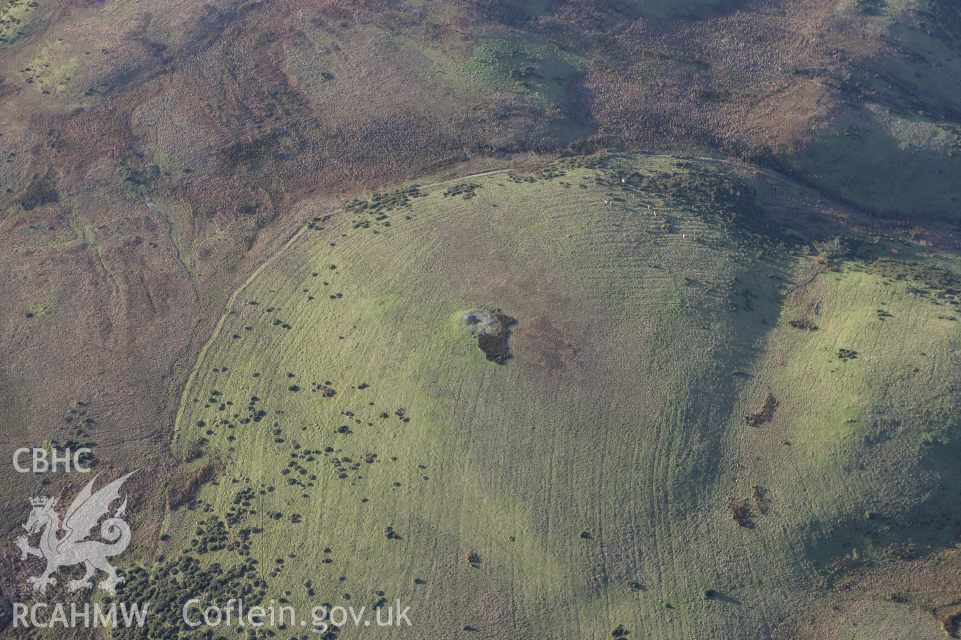 RCAHMW colour oblique photograph of Pen Cad Cymry Cairn. Taken by Toby Driver on 11/12/2007.