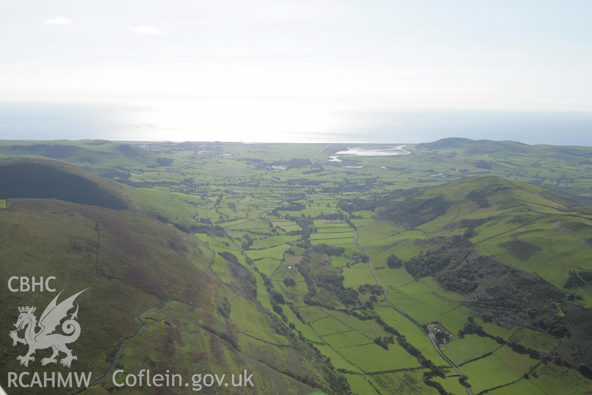 RCAHMW colour oblique aerial photograph of the resort area of Tywyn. Taken on 06 September 2007 by Toby Driver