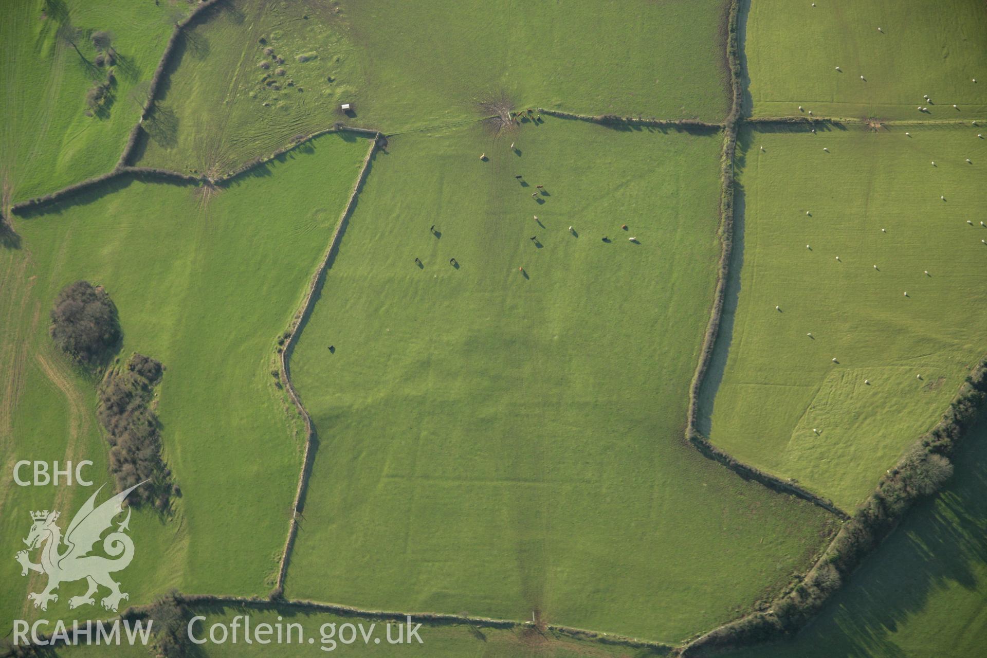 RCAHMW colour oblique aerial photograph of the Viking settlement at Glyn, Llanbedrgoch. Taken on 25 January 2007 by Toby Driver