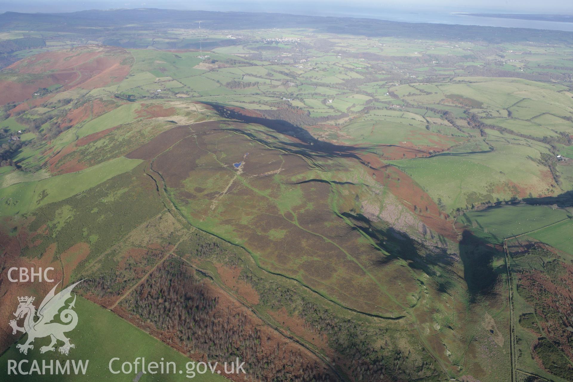 RCAHMW colour oblique photograph of Penycloddiau hillfort. Taken by Toby Driver on 11/12/2007.