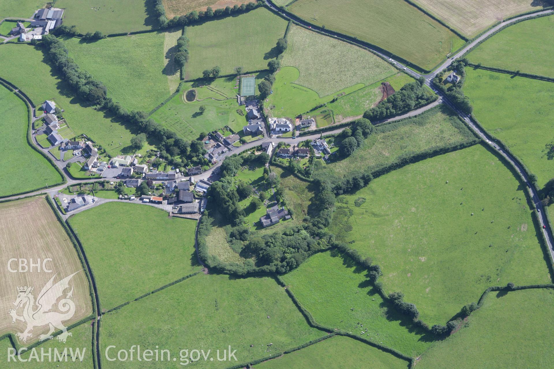 RCAHMW colour oblique aerial photograph of St Maelog's Church, Llandyfaelog, showing the circular churchyard. Taken on 30 July 2007 by Toby Driver