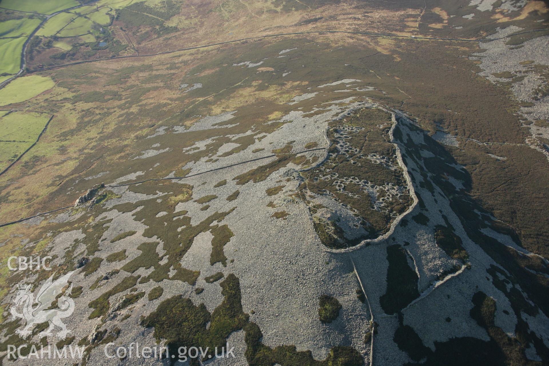 RCAHMW colour oblique aerial photograph of Tre'r Ceiri Fort, Llanaelhaearn. Taken on 25 January 2007 by Toby Driver