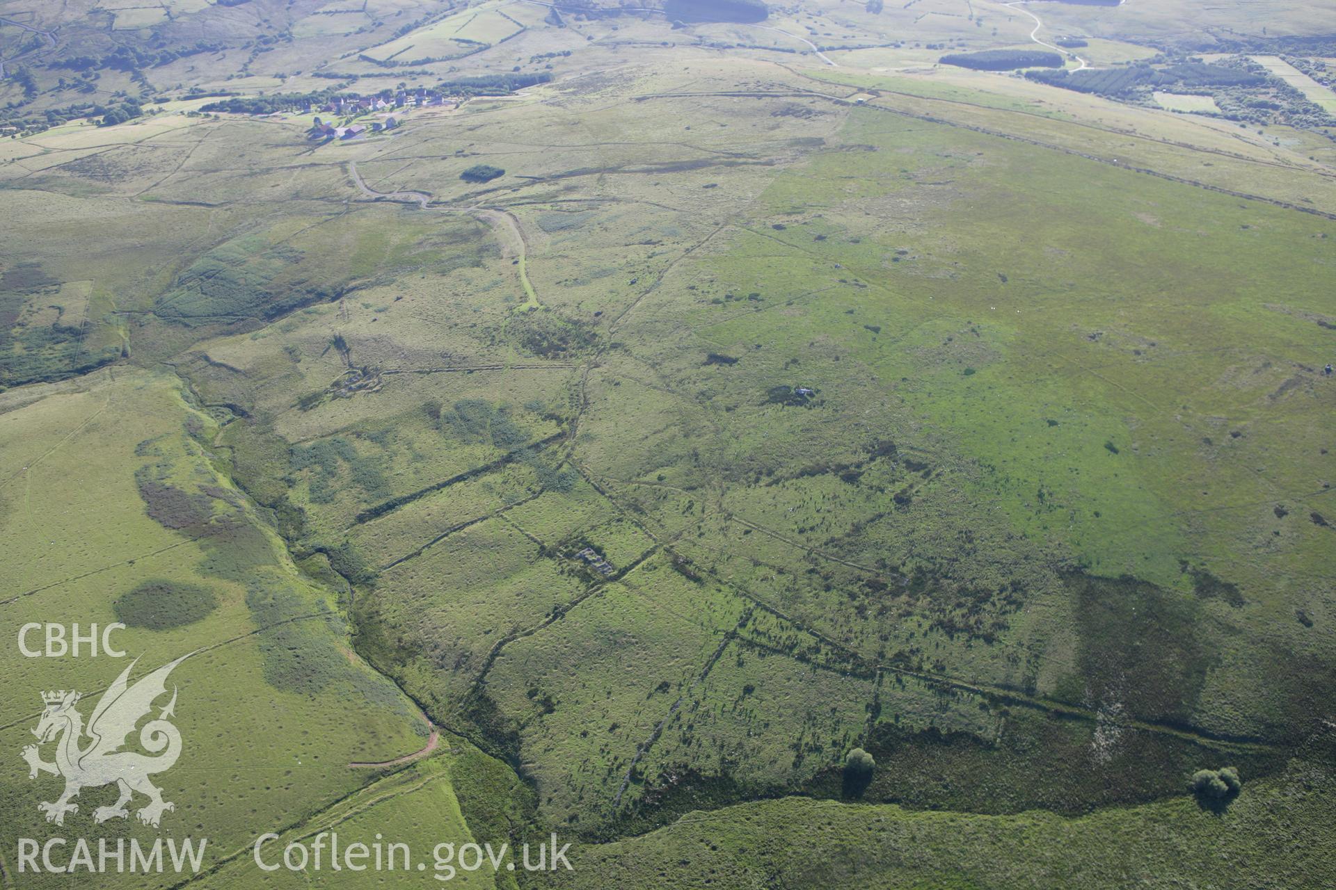 RCAHMW colour oblique aerial photograph of Glan-y-Rhyd Farmstead and surrounding landscape. Taken on 08 August 2007 by Toby Driver