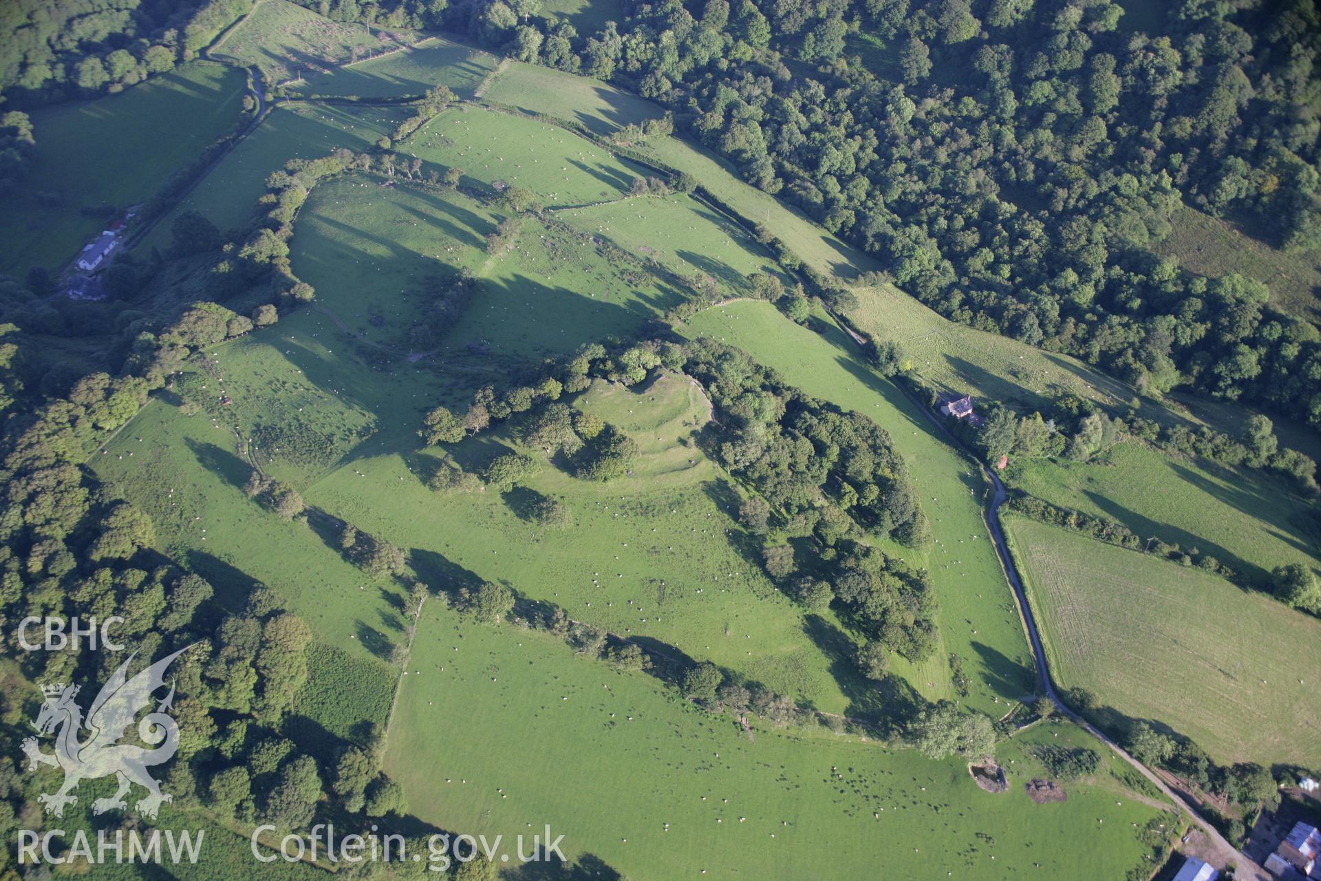 RCAHMW colour oblique aerial photograph of Corn y Fan Defended Enclosure, Merthyr Cynog. Taken on 08 August 2007 by Toby Driver