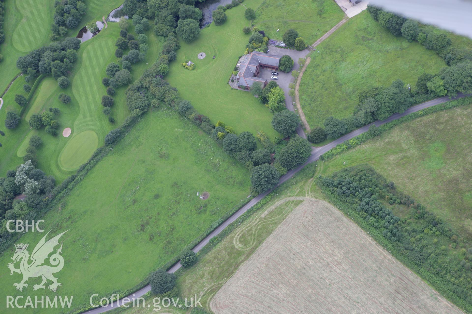 RCAHMW colour oblique aerial photograph of Cae'rarfau Burial Chamber. Taken on 30 July 2007 by Toby Driver
