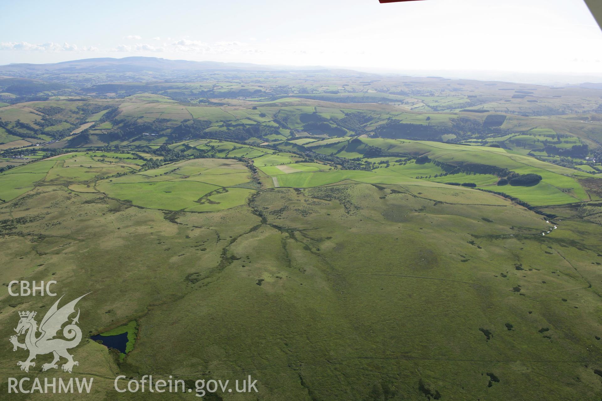 RCAHMW colour oblique aerial photograph of Llyn Dwr landscape. Taken on 08 August 2007 by Toby Driver